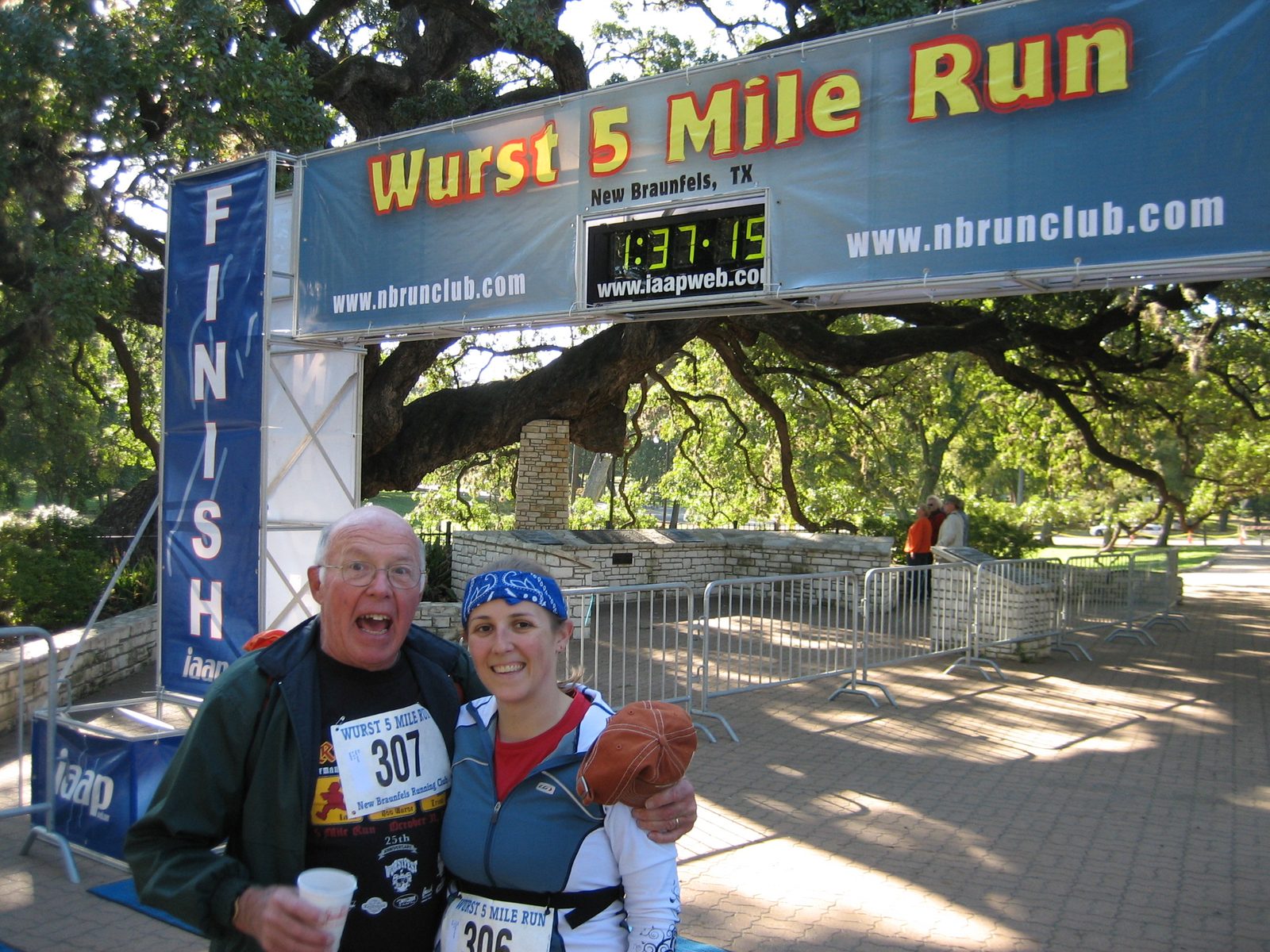 Funny photo of Dad and Catherine after Dad finished (in around 1:35, walking all five miles). ...
