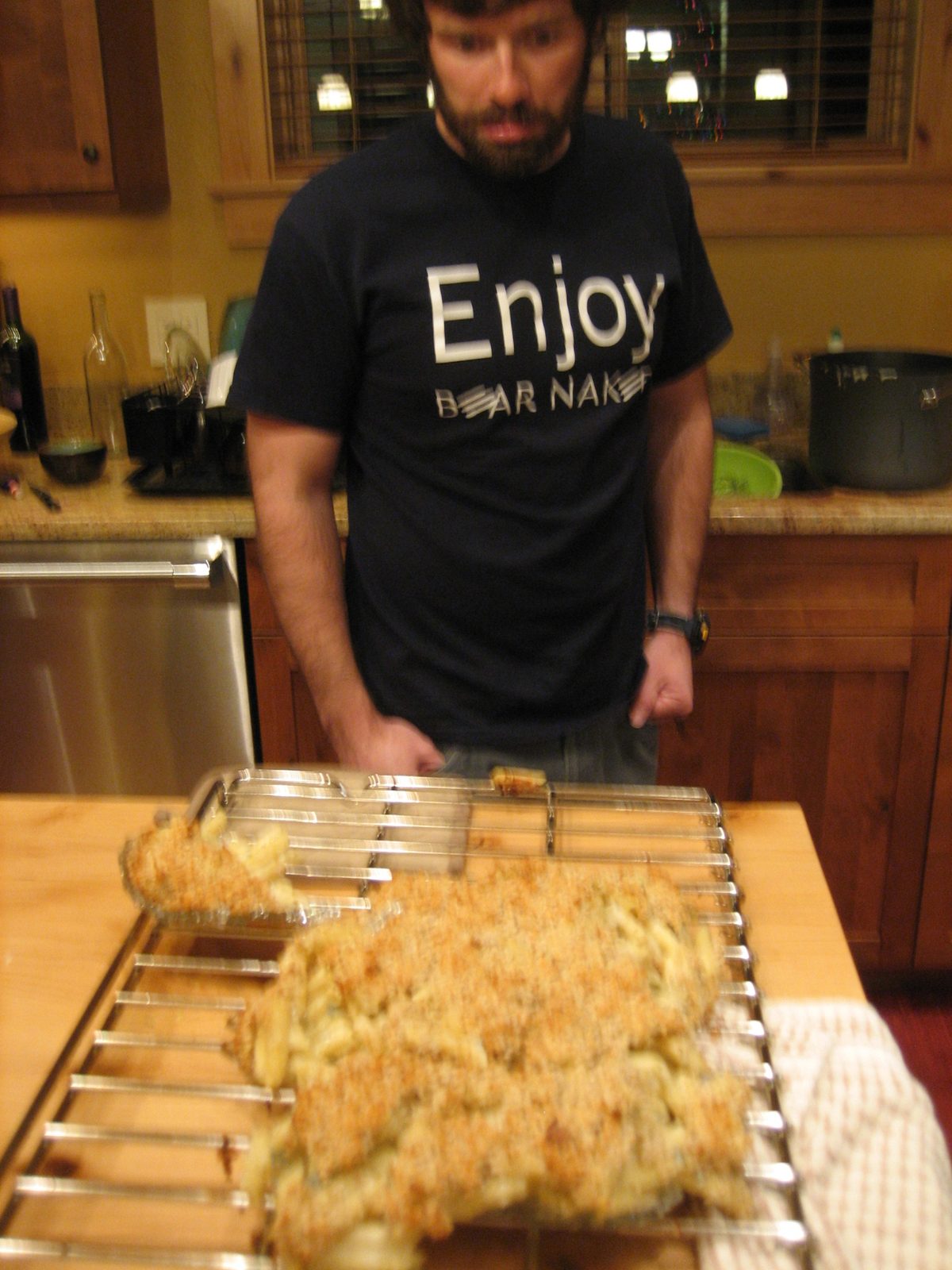 Jay looks gloomily at the exploded mac and cheese.  No more dinner :(