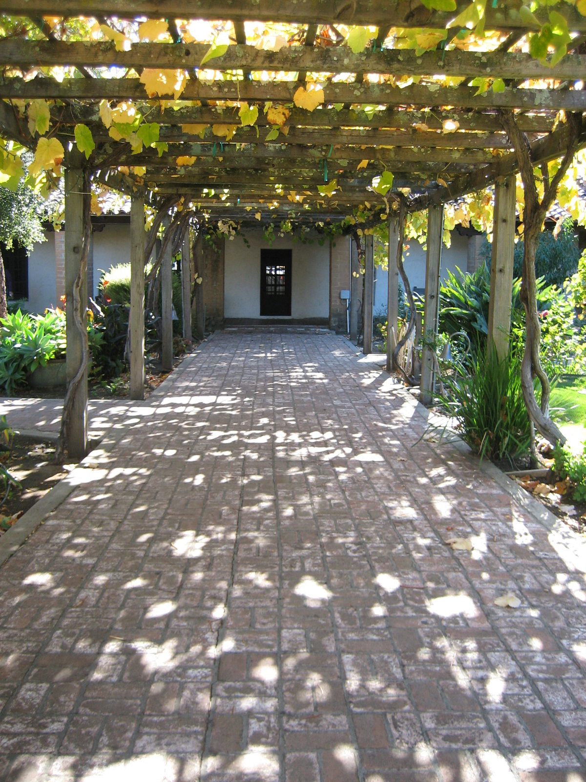 Pathway to a side door into a church building.