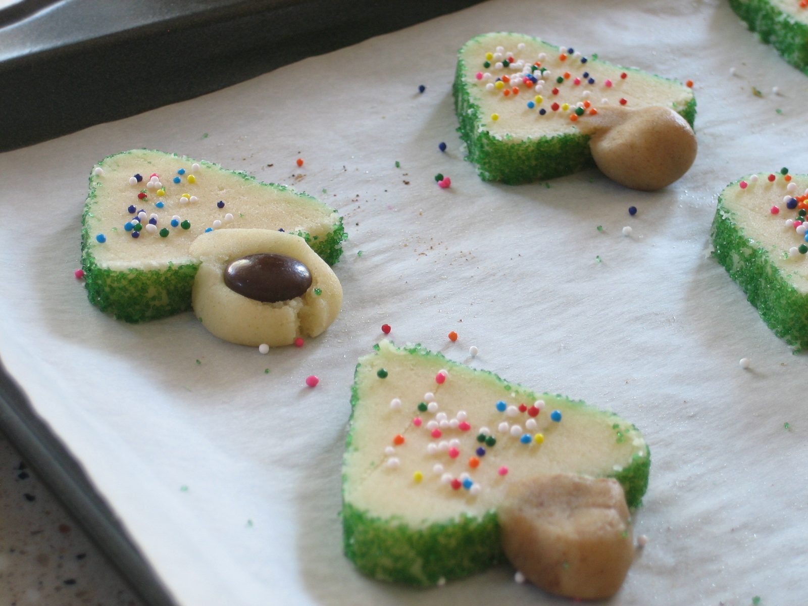 Cinnamon trunks and an M&M trunk get ready to be baked.