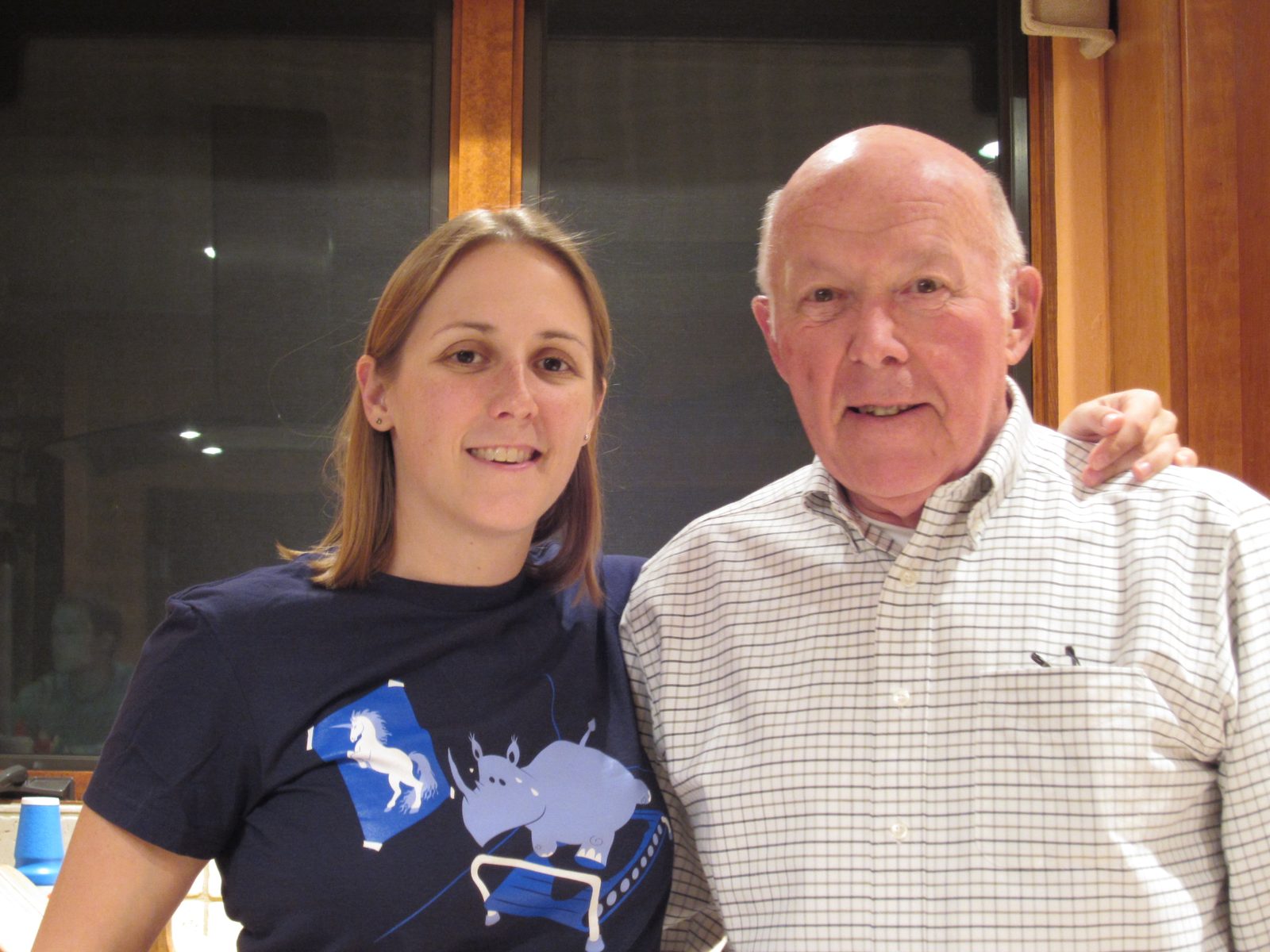 Catherine and Dad (and a running rhino) in the kitchen.