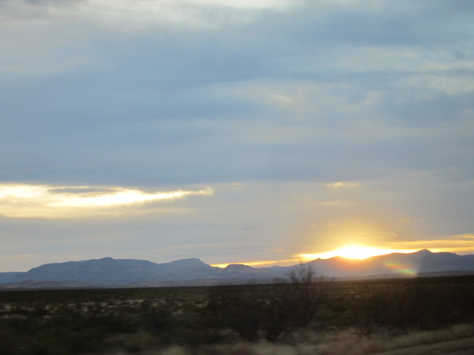 Uh-oh.  Sunset.  The speed limit dropped from 80 (80!!) to 65 at sunset.  This significantly...