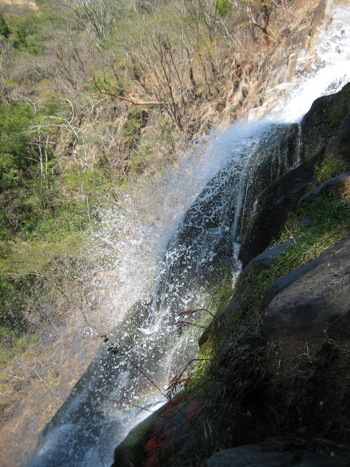 Spraying water.