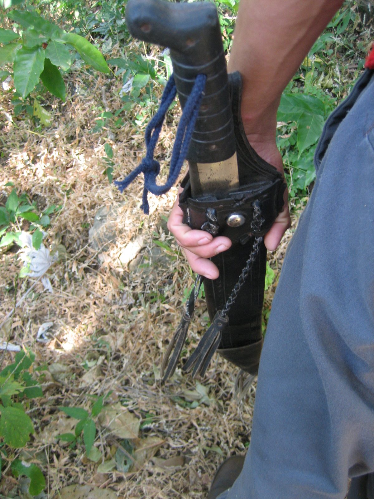 Abel with the crazy machete he and Miguel used for hacking down branches and the like.