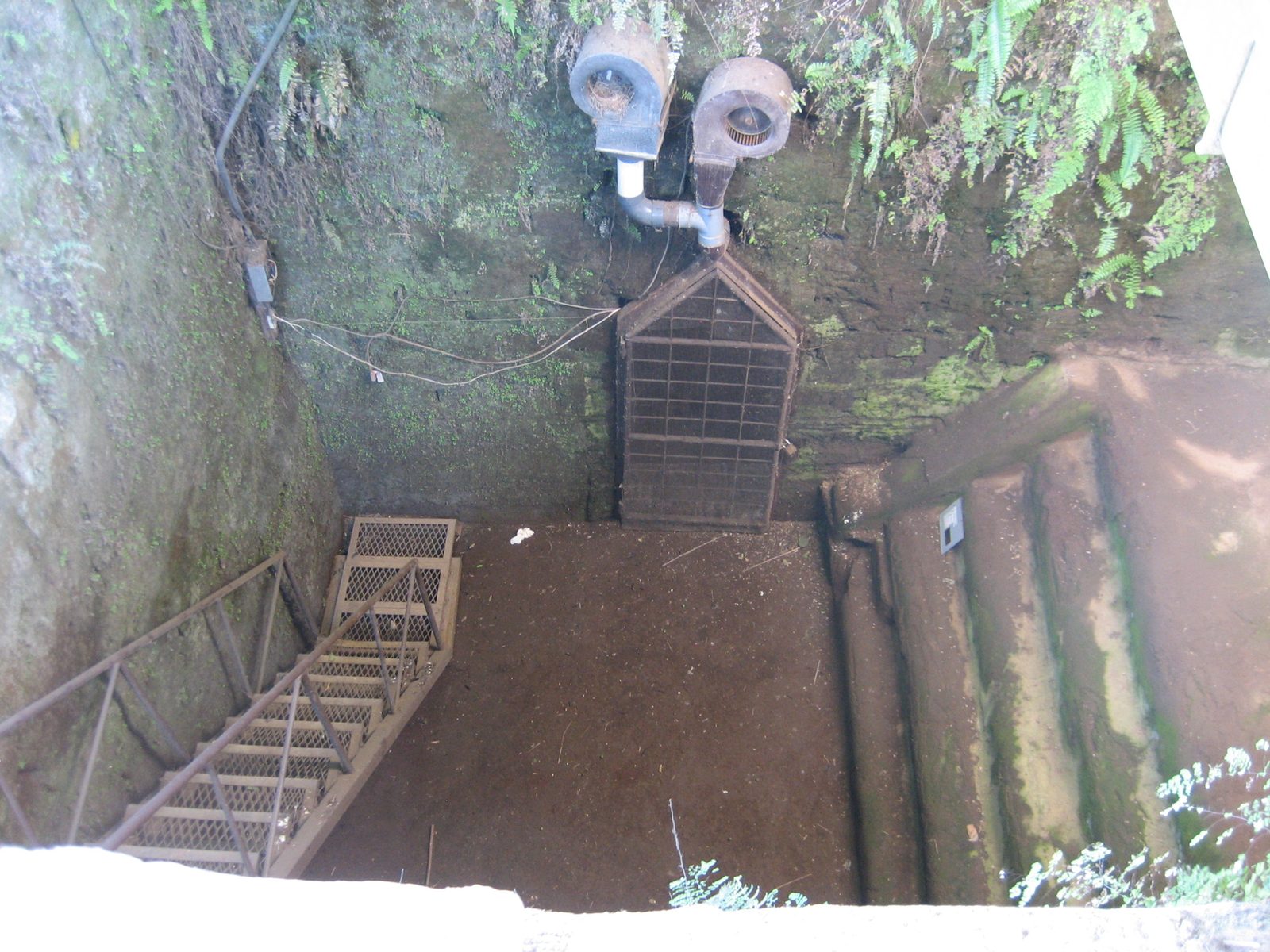 Looking down into the previously-mentioned excavation.  The tunnel through that door looked very small.