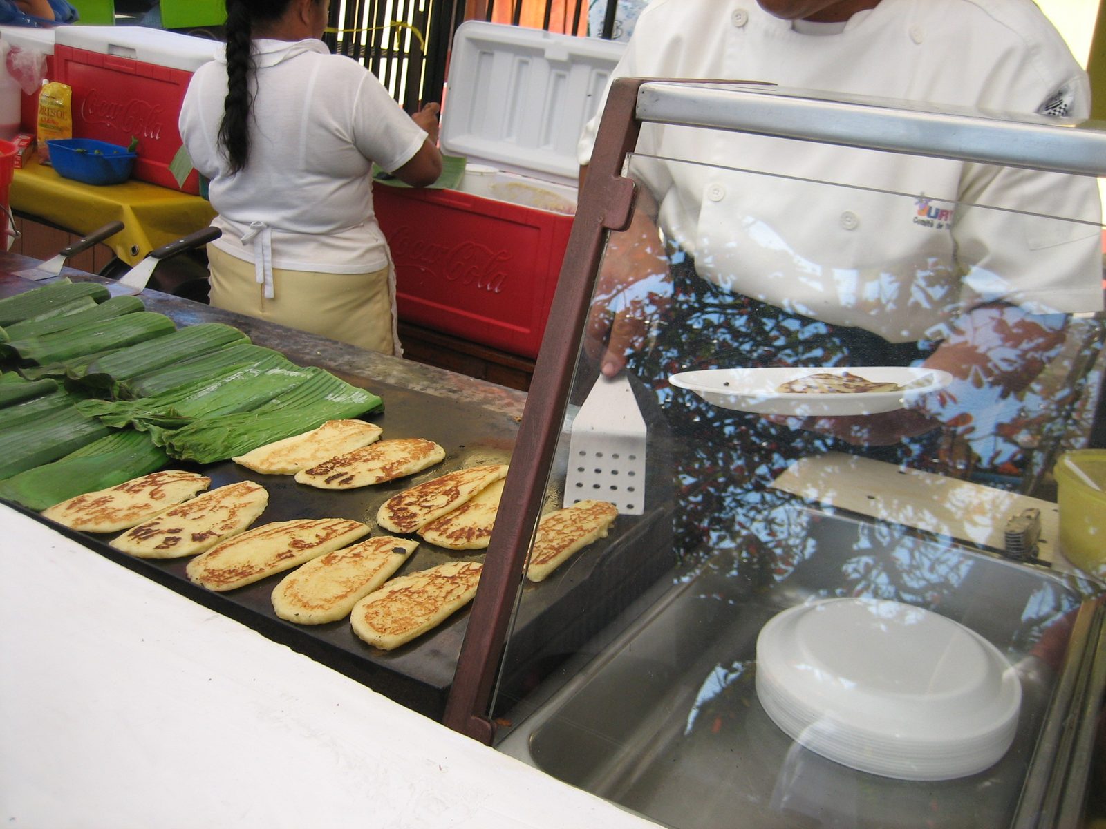 Pupusa + corn-like bread food.  Tasty.