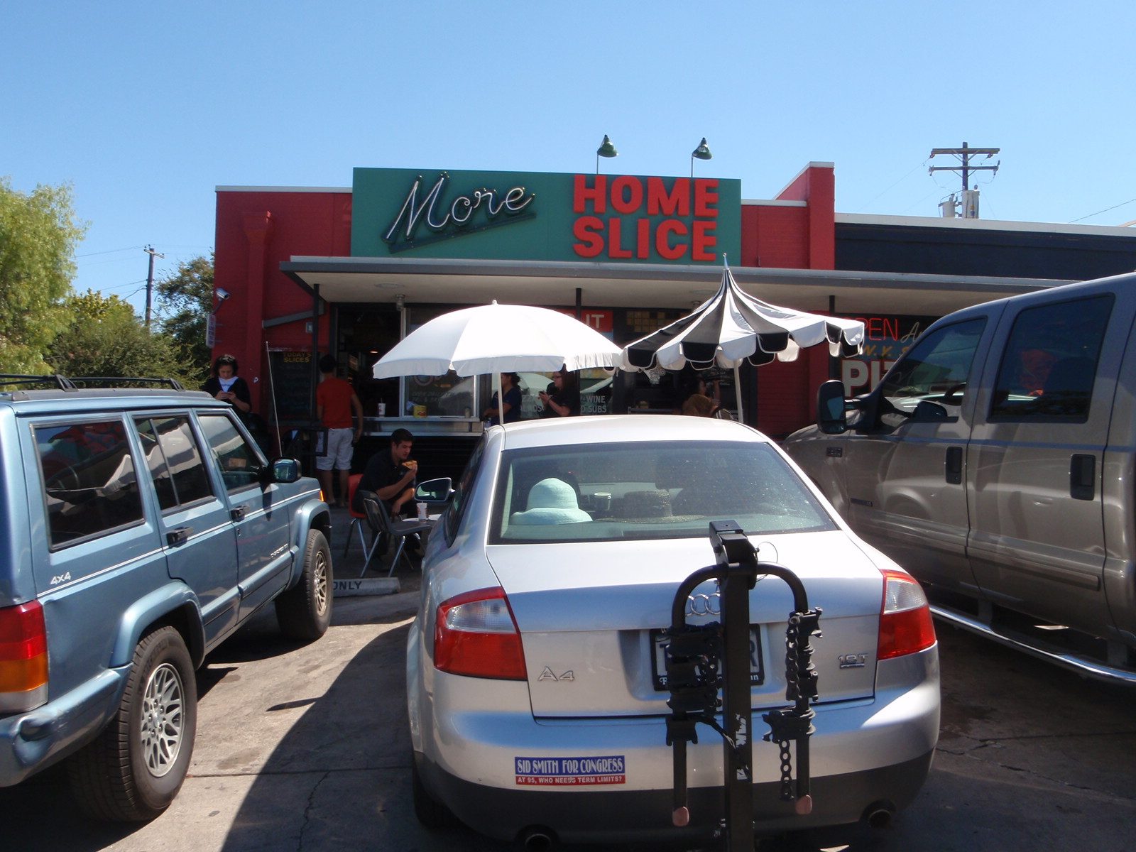 Home Slice's slice bar, next door to the main store, where slices are available for takeout.