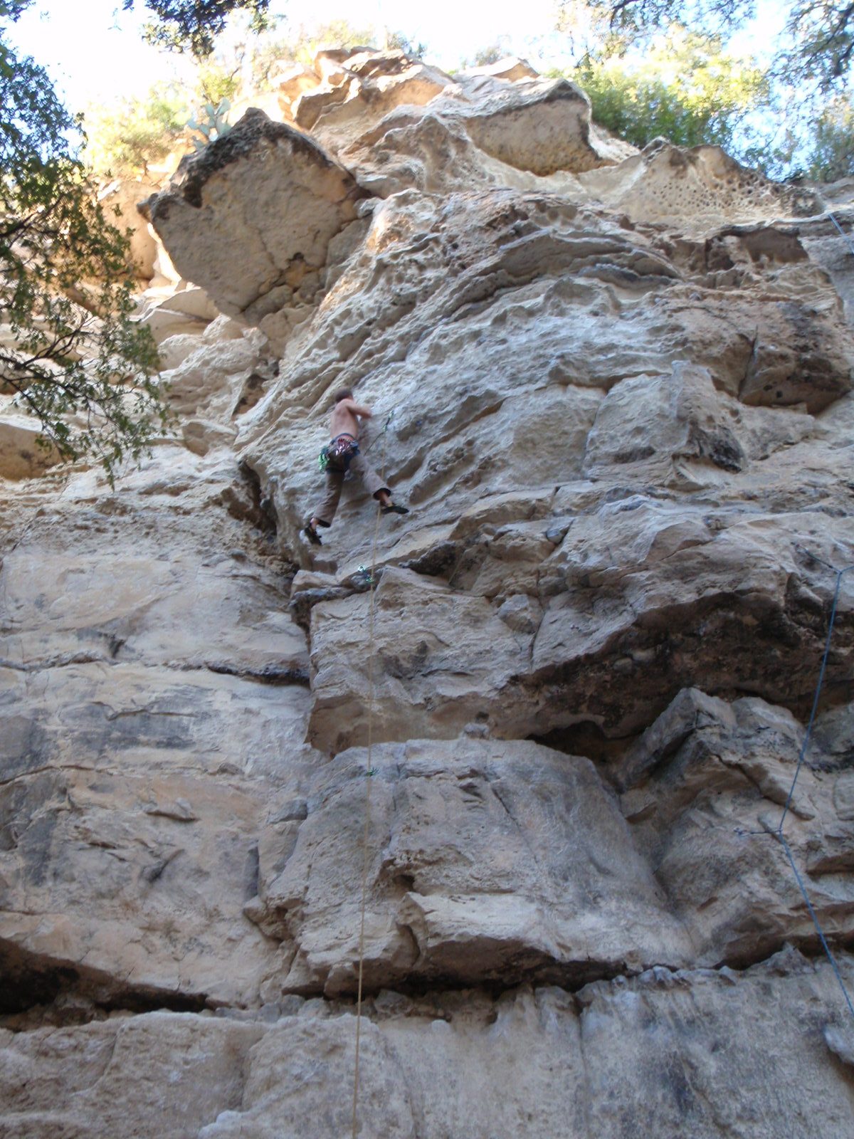 John blends into the rock.