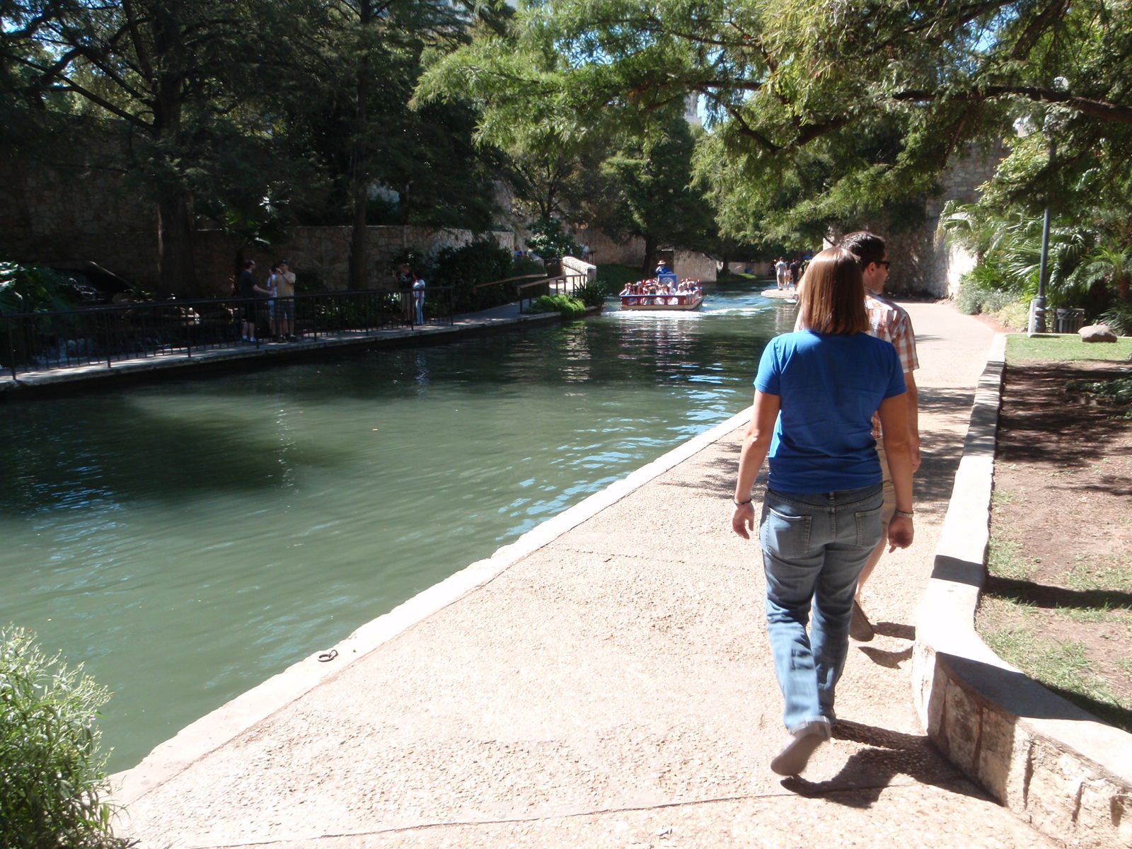 Walking on the Riverwalk in San Antonio.