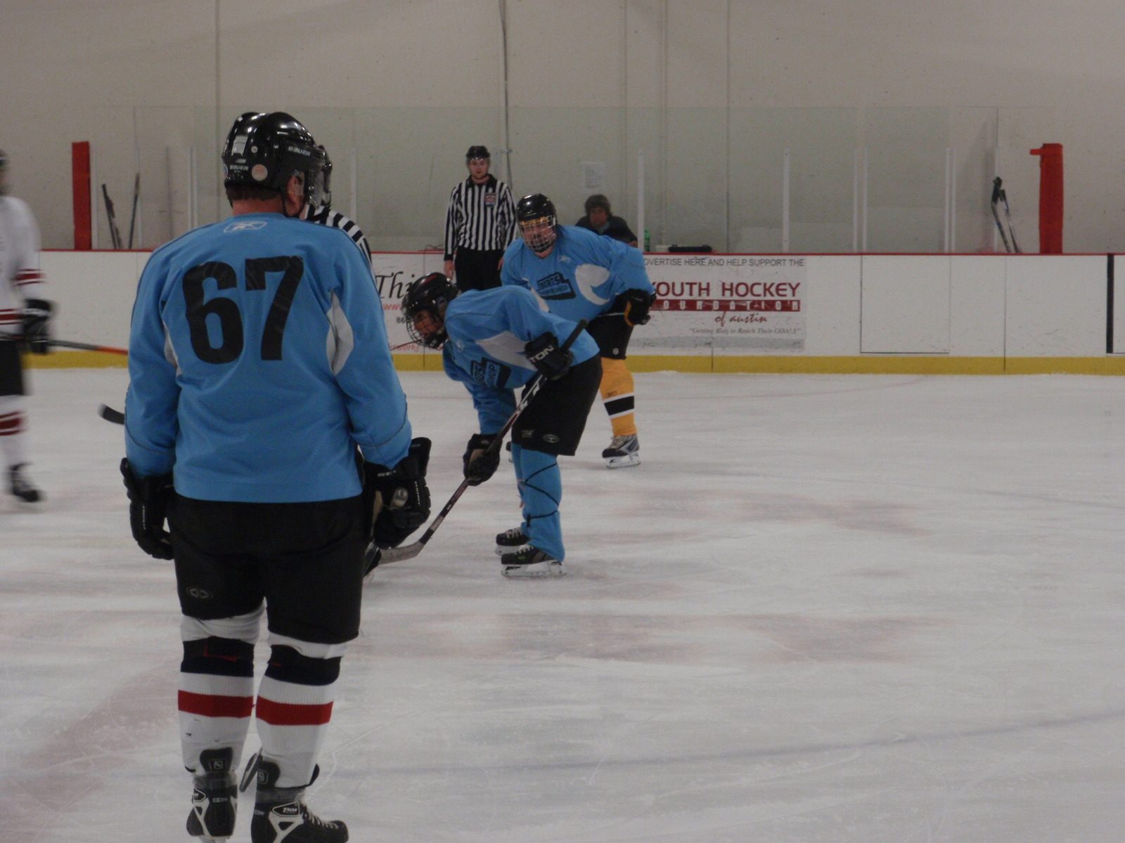 Faceoff!  Get ready for the puck, Steve (#67).