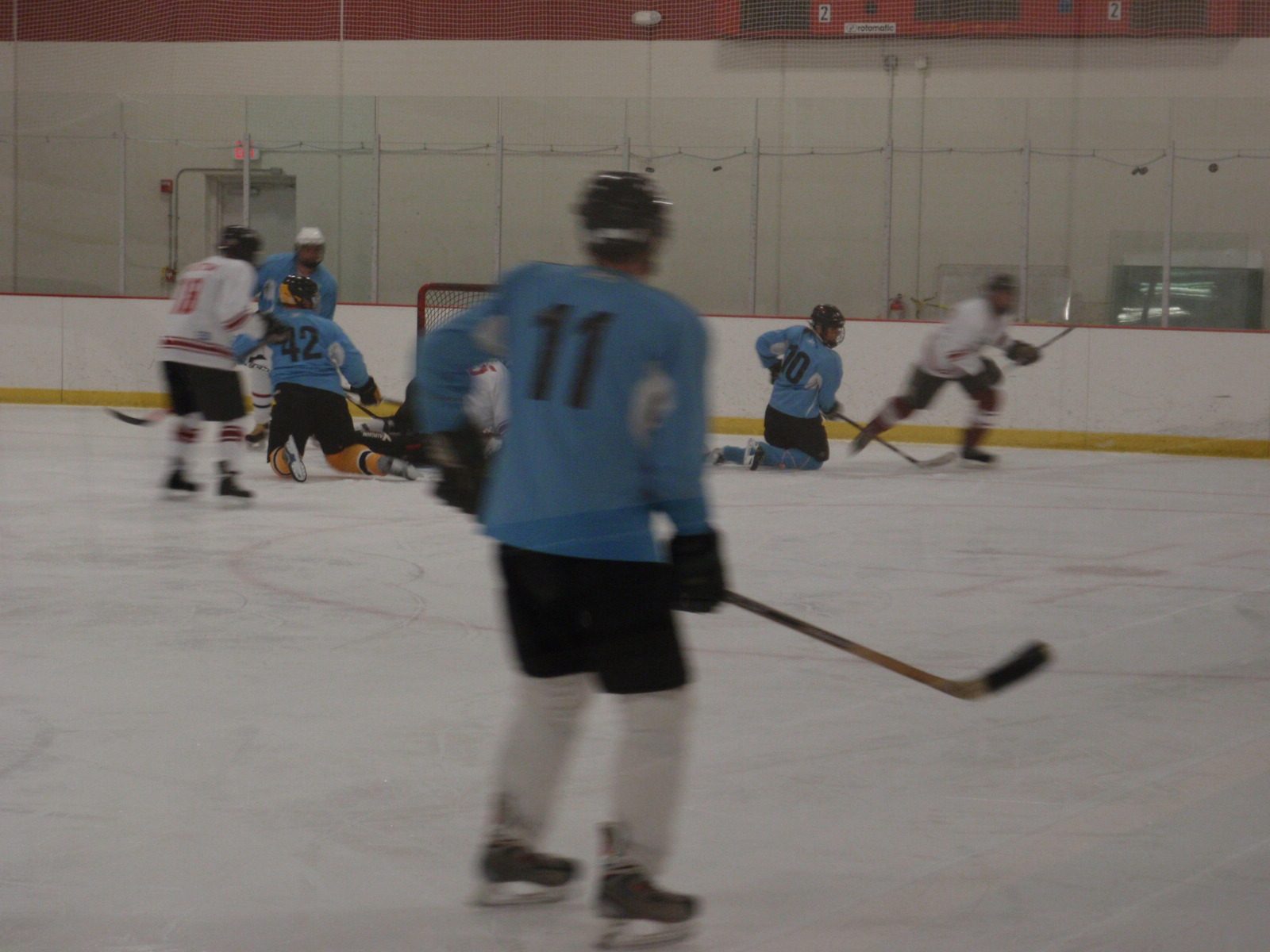 Somehow, every time I fall down in front of the net, John Carrell (#42) does too.