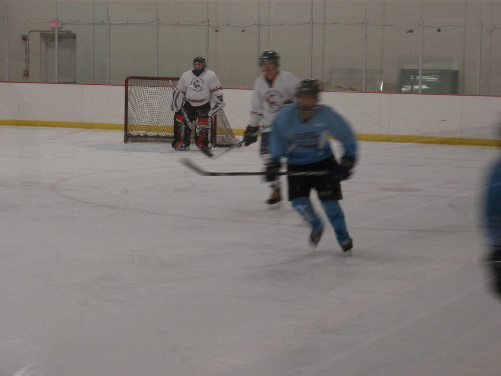Skating out of the zone.