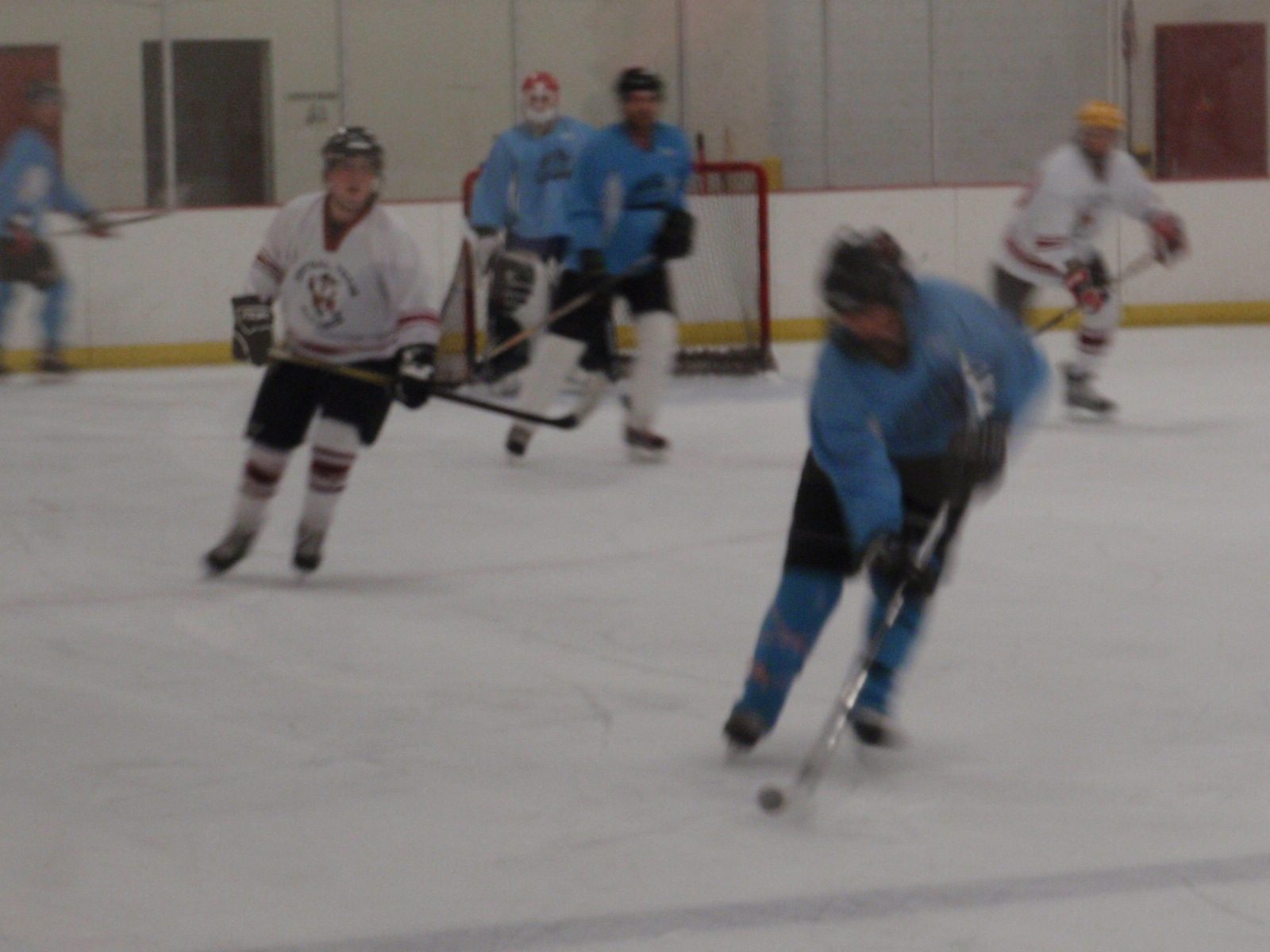 Carrying the puck out of our zone.