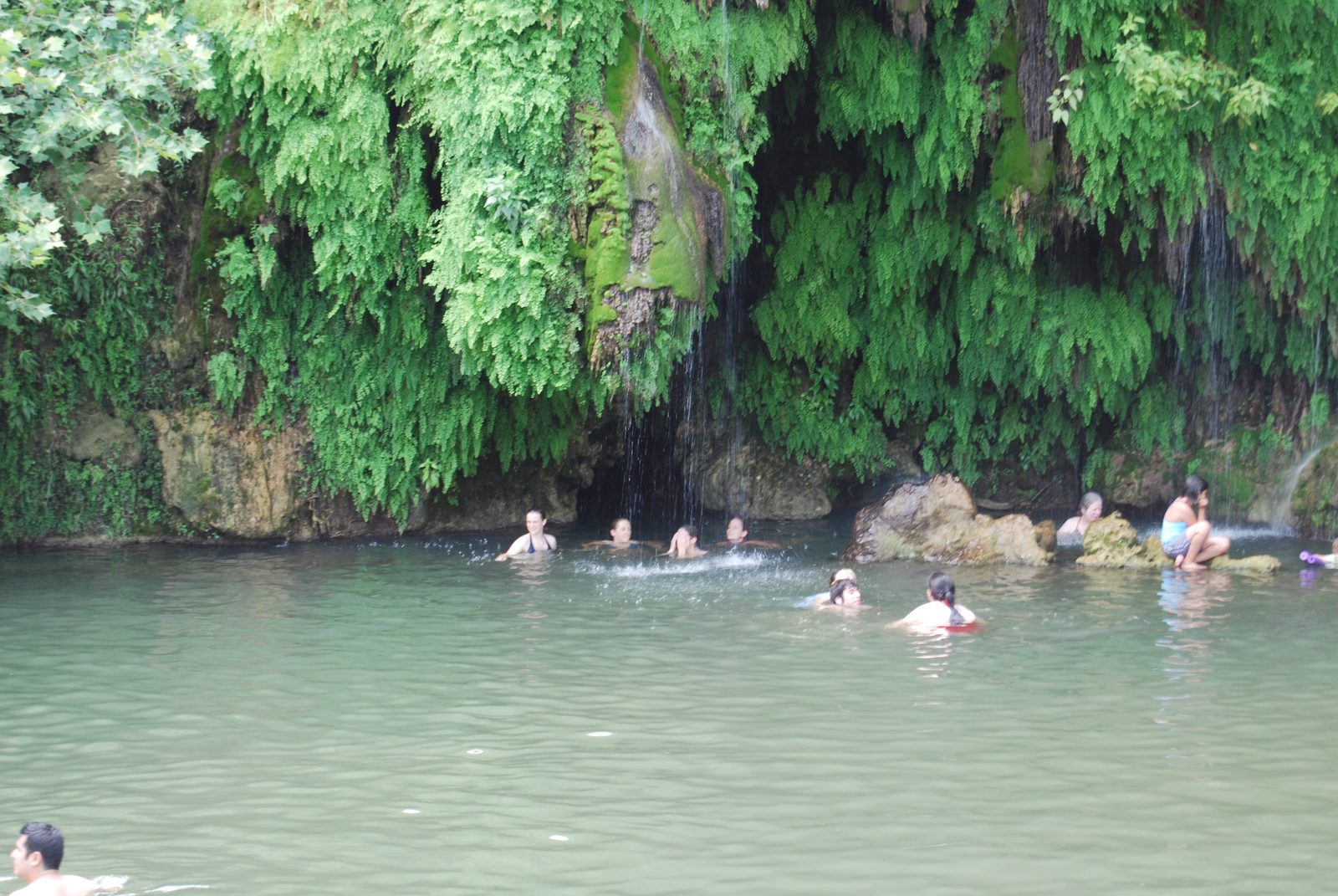 Playing in the waterfall.