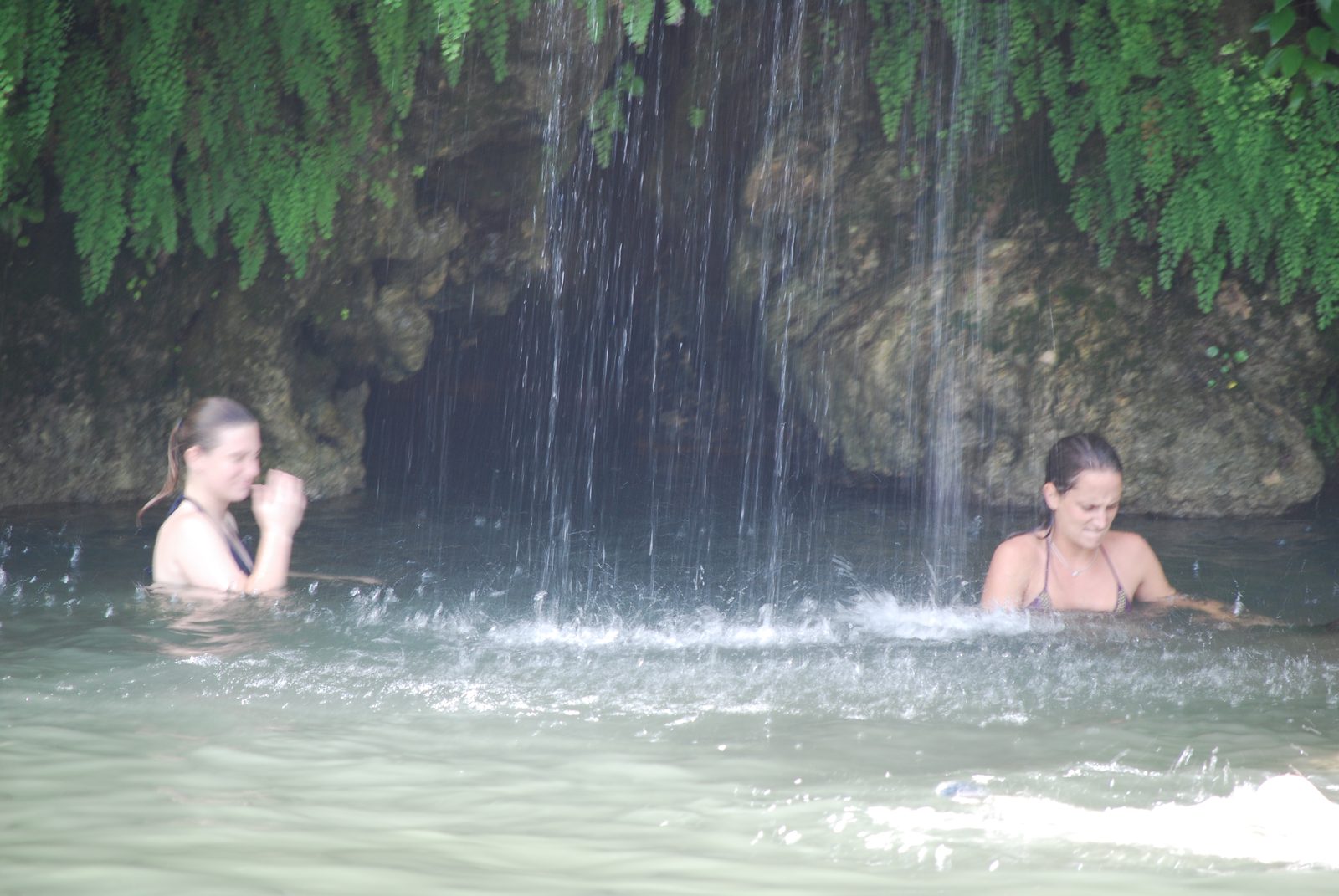 Kelly (sister to Kerry, a coworker) and Nancy under the waterfall, which was much colder than...
