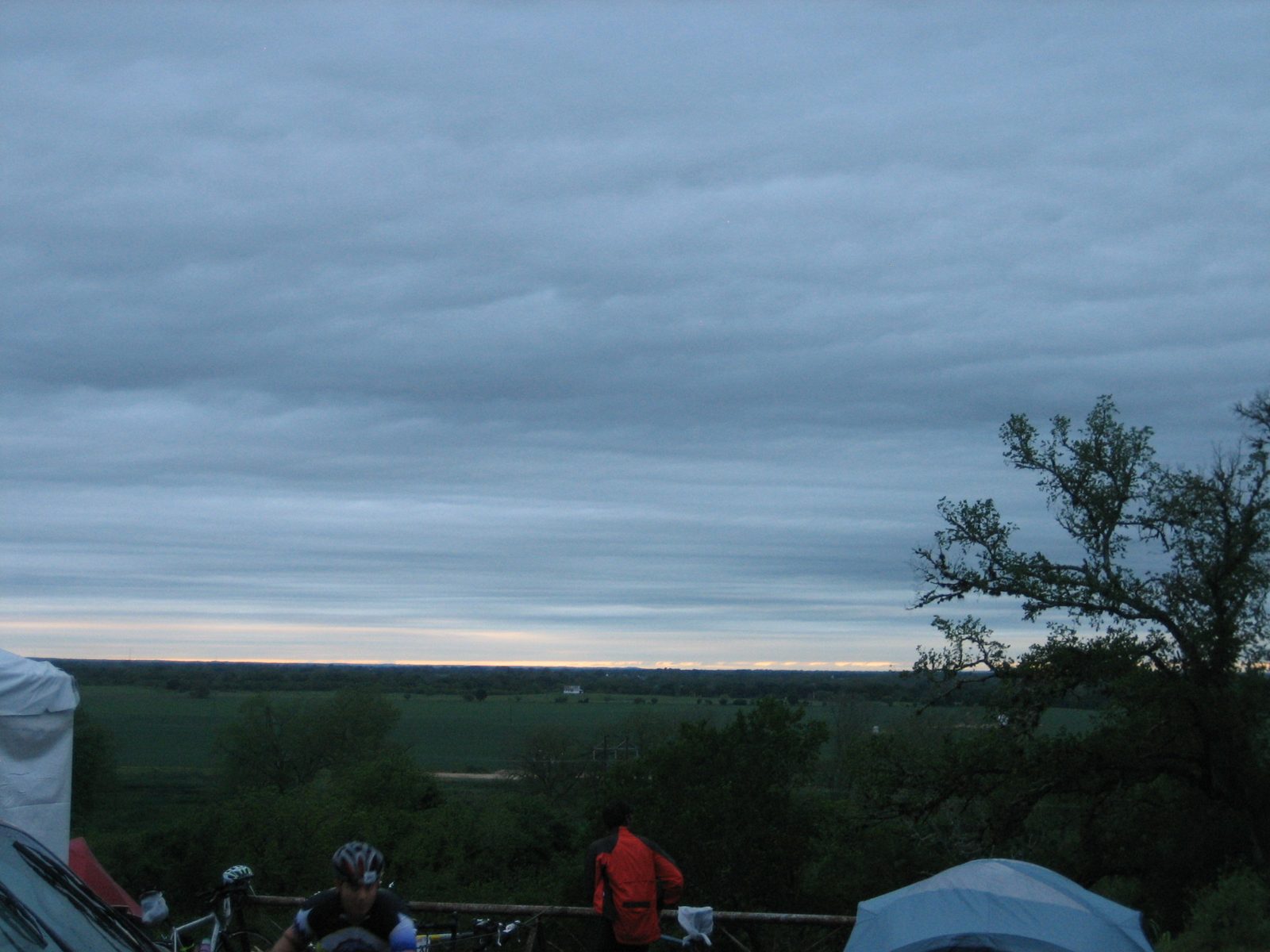 Sunrise over the field near our tent (the corner of which is visible to the left).