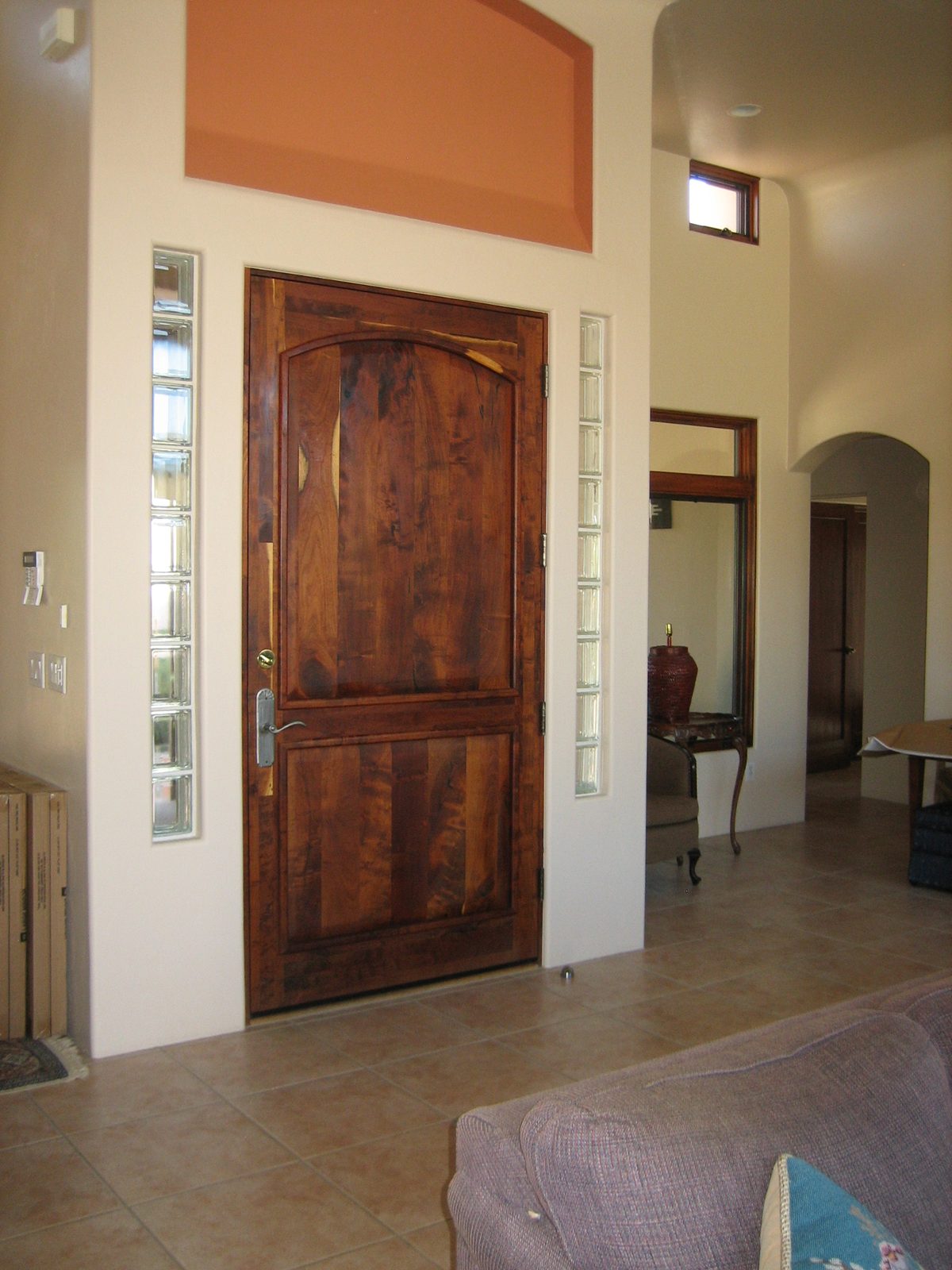Big cedar door into the house / living room.  Gotta figure out what goes in the alcove above.
