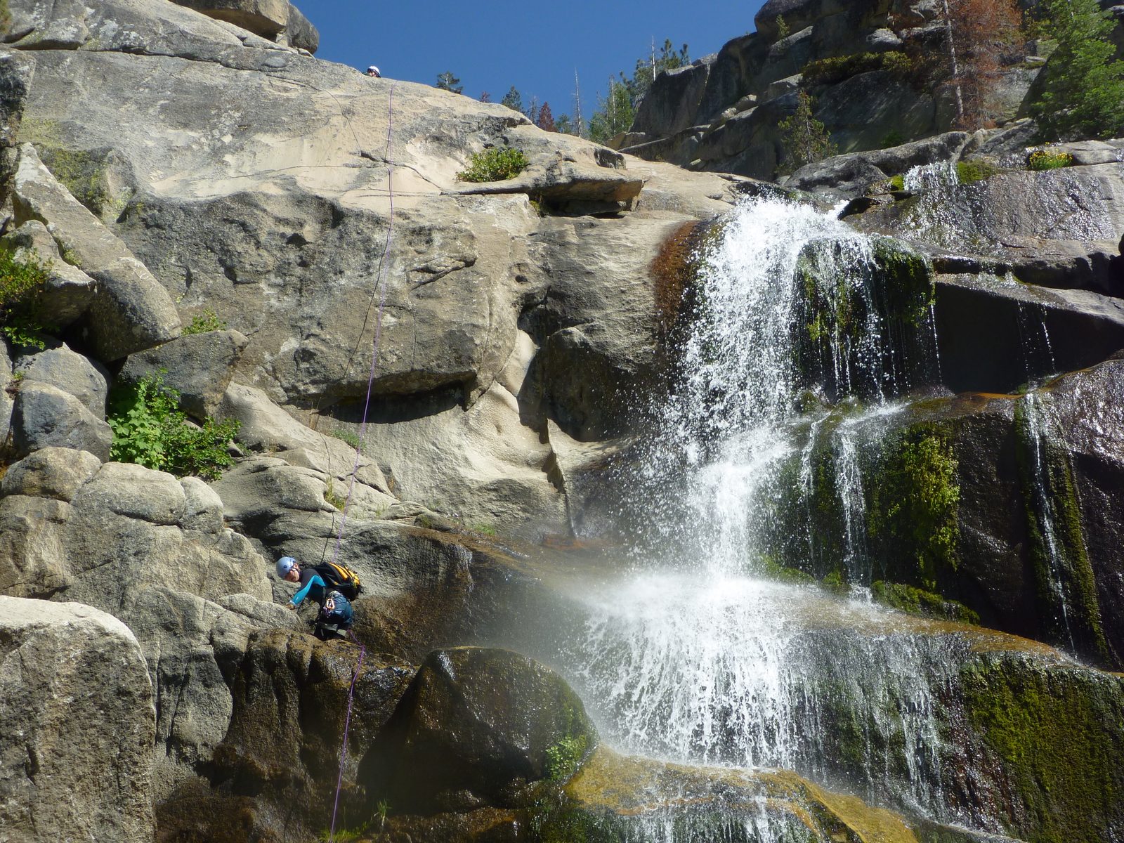 ... pausing to climb over a ledge...