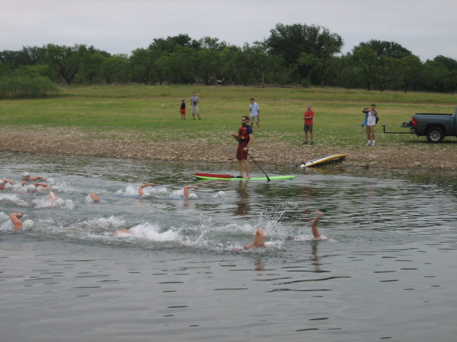 Swimmers splash by.