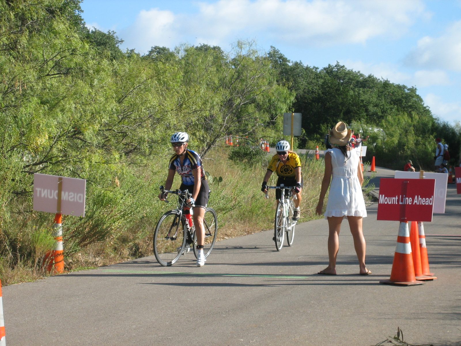 Dismounting.  The lady in yellow basically came up right next to me, and got my right foot in...