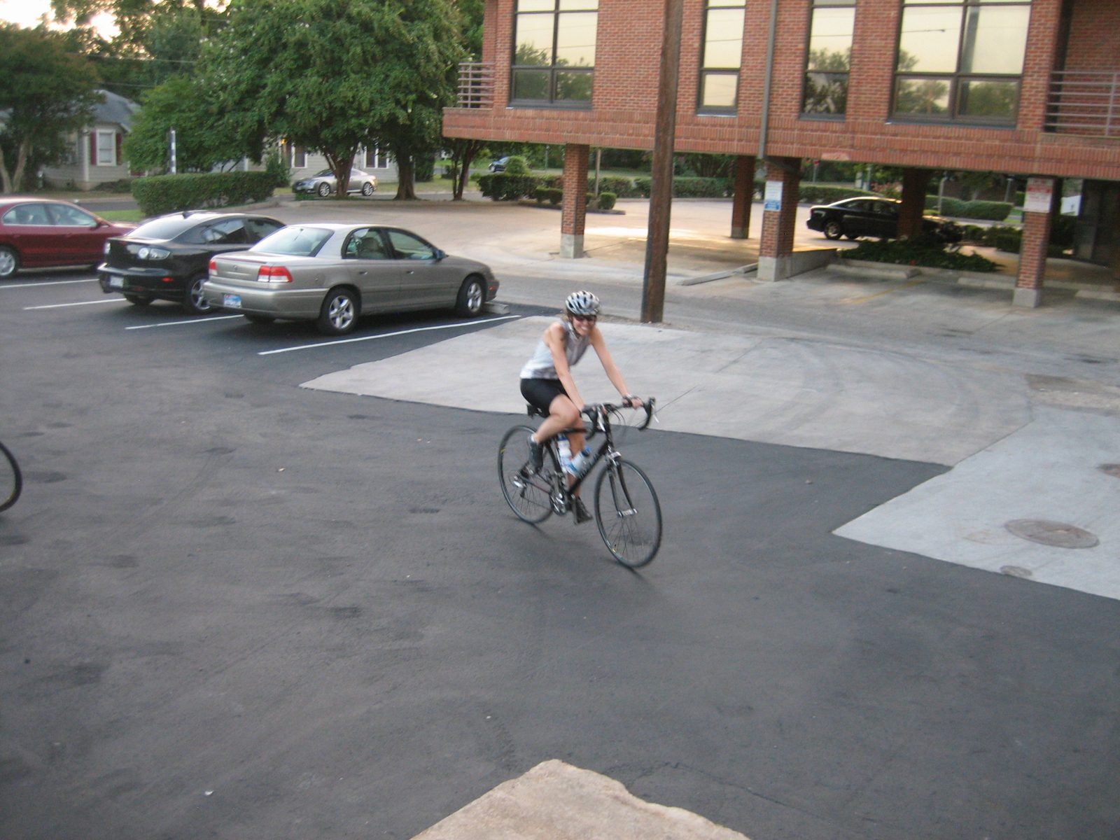 Lori rides into the TD3 parking lot.