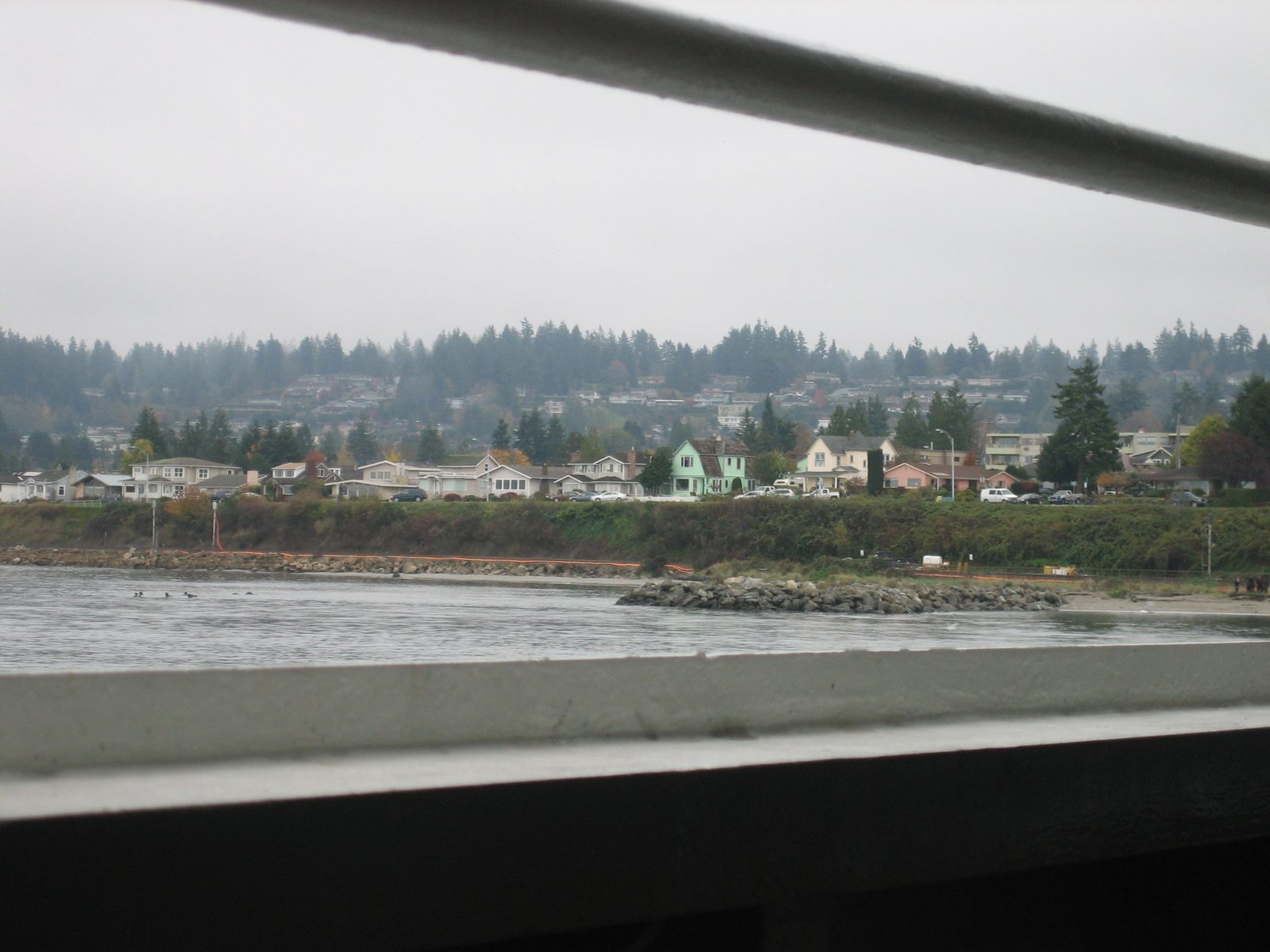 Look closely to see the two groups of scuba divers (one on land, one in the water).  Brr.