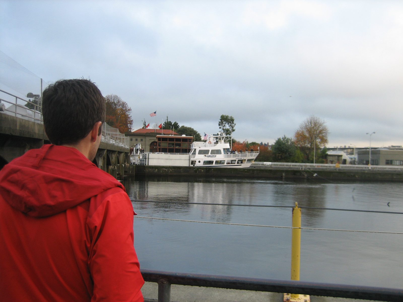 Jay watches a ship come through the lock as the skies begin to clear.
