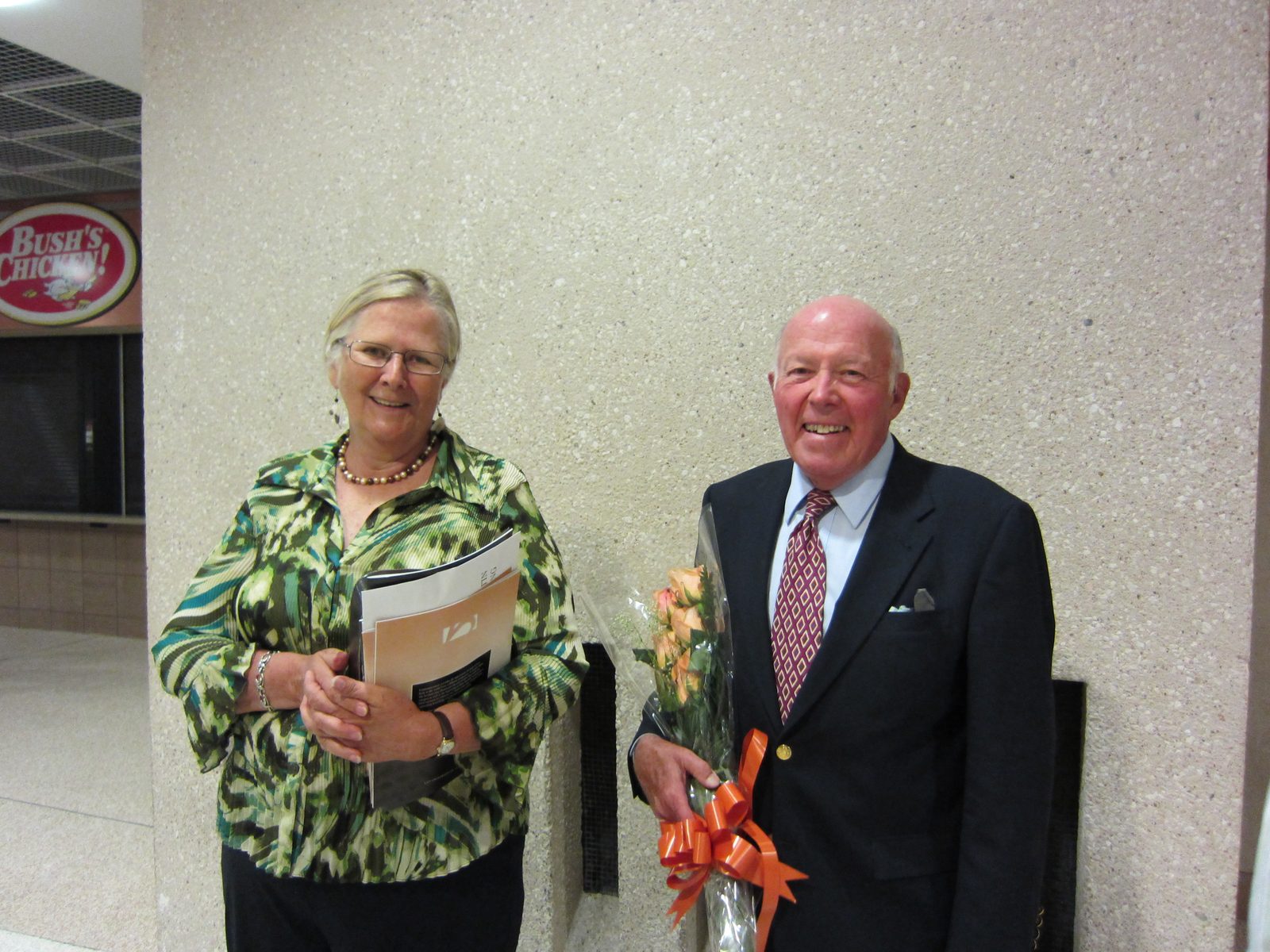 Mom and Dad, looking proud.