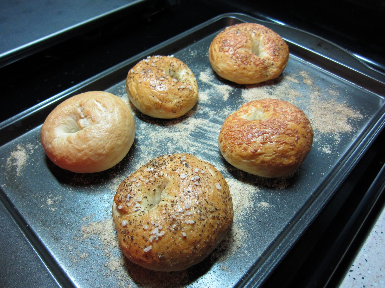 First tray out of the oven!  Catherine's bagels: plain, salt-and-pepper, cheese-and-pepper,...