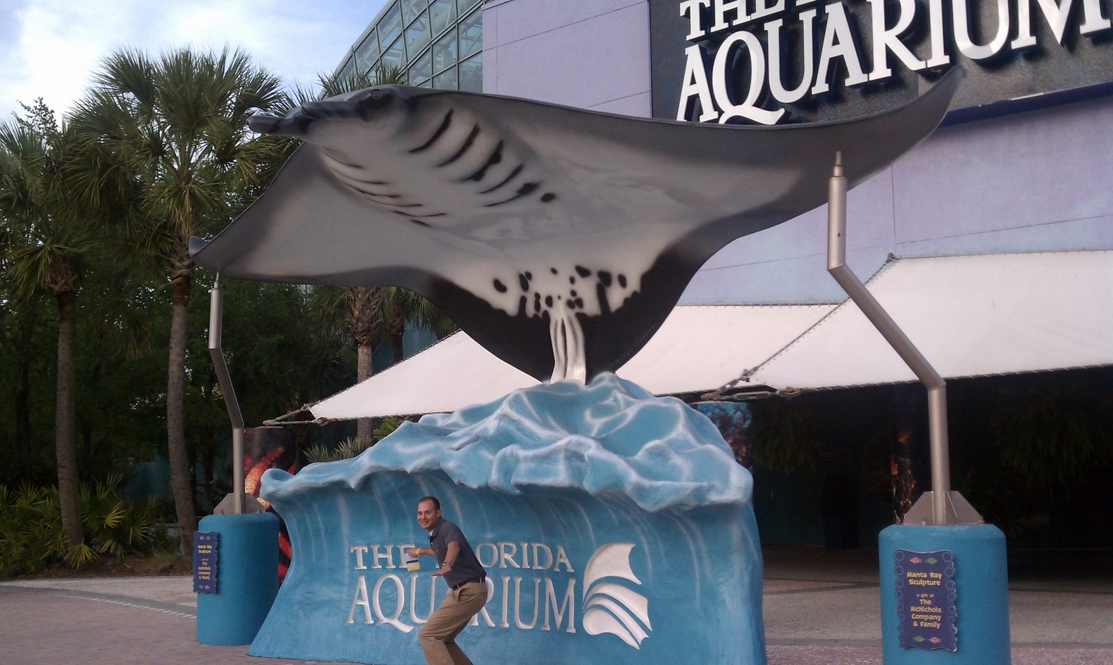 Co-worker / friend / fellow UVa grad Eric Giannini poses in front of the Florida Aquarium, where...