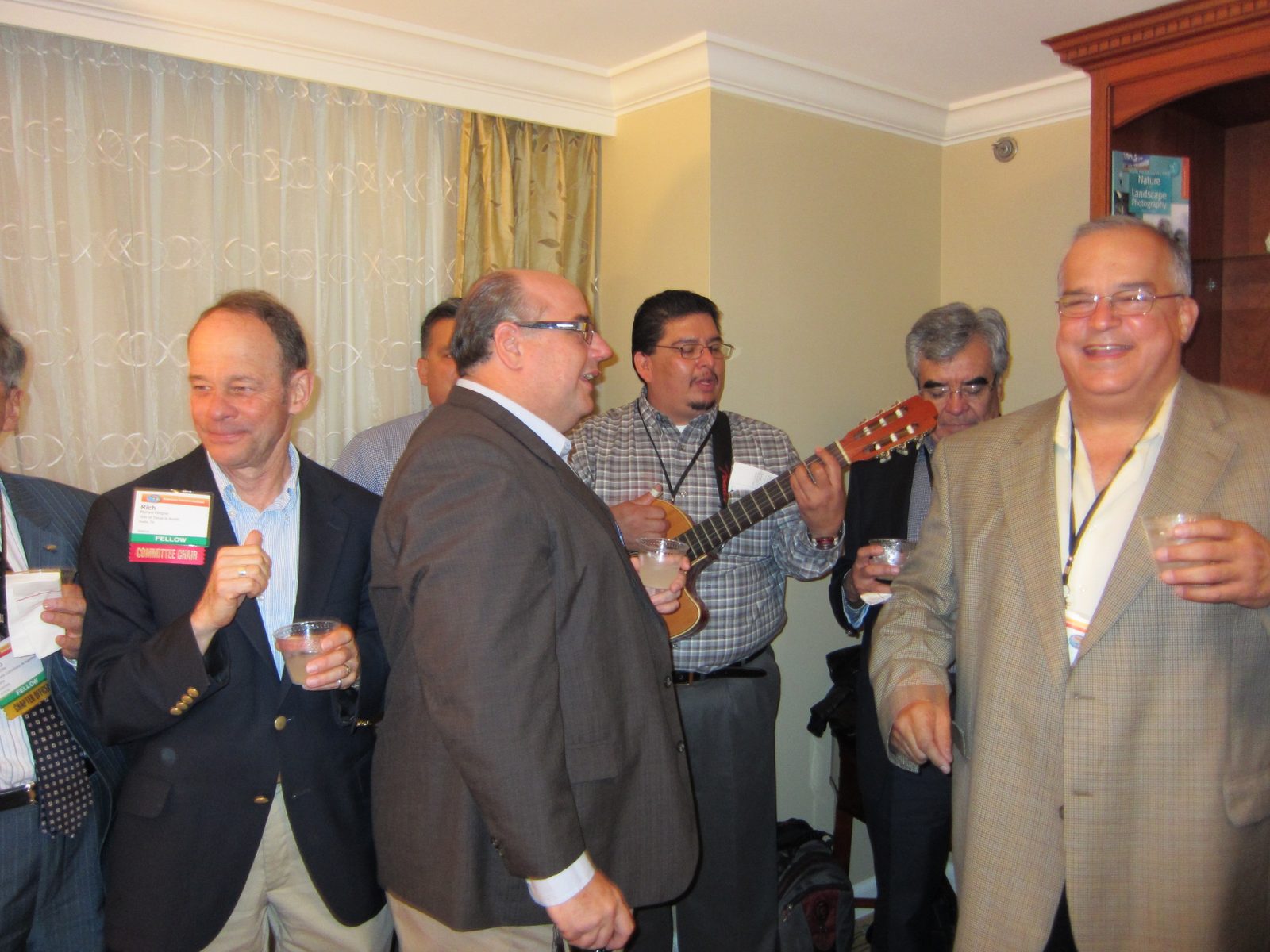 A staple of this party is the singing.  All in Spanish.  The gentleman on the right is the...