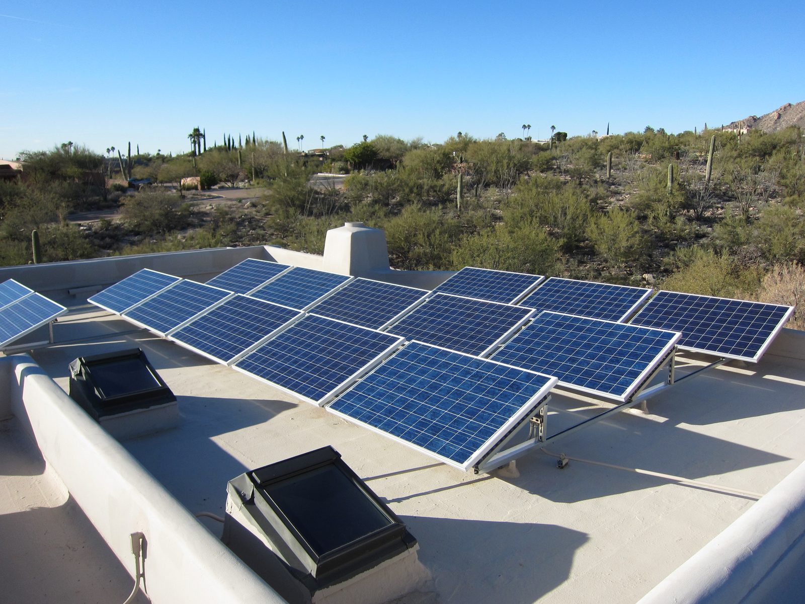 Solar panels, skylights, and the guard shack.