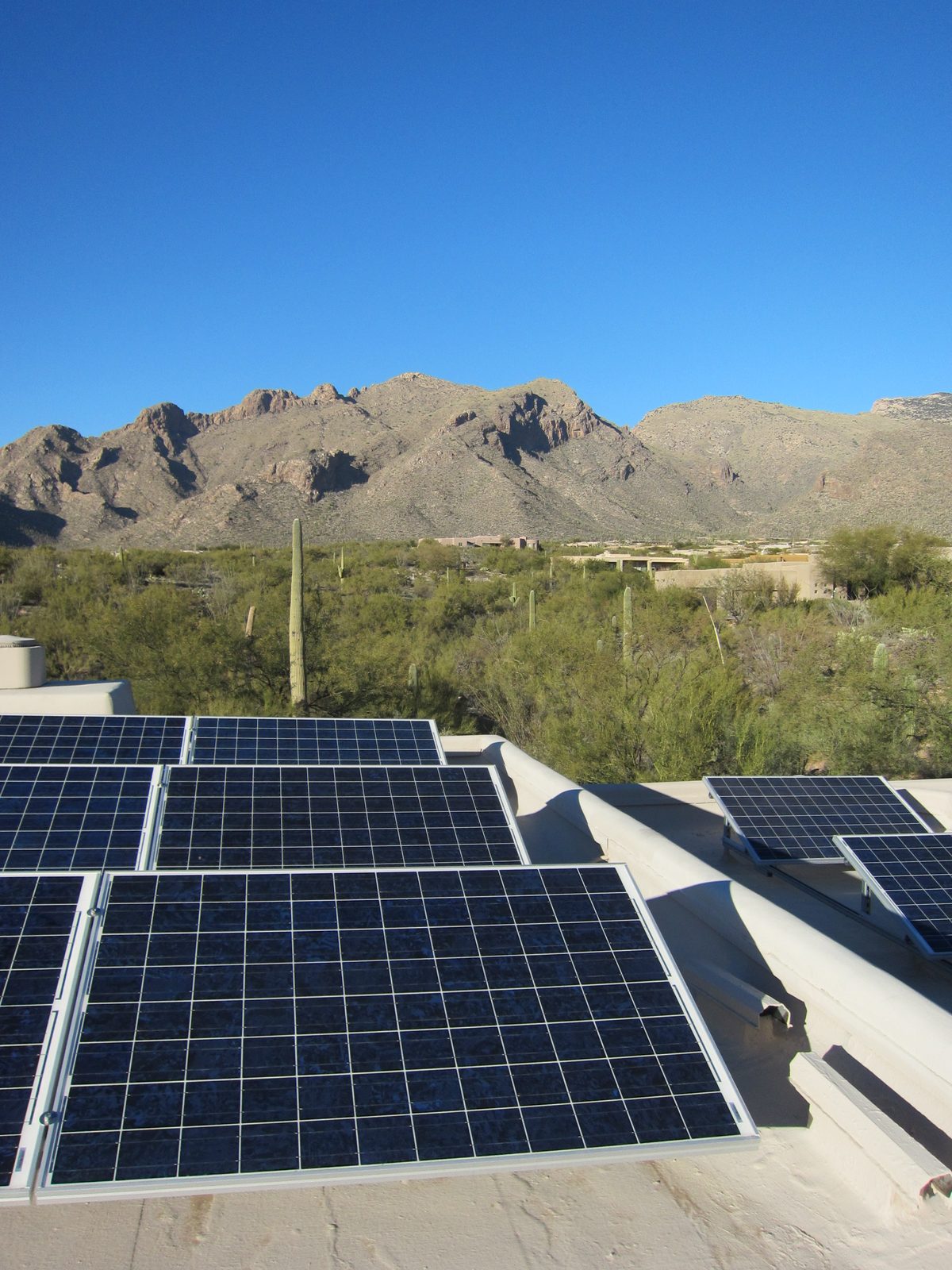 Mountains + desert + solar panels.