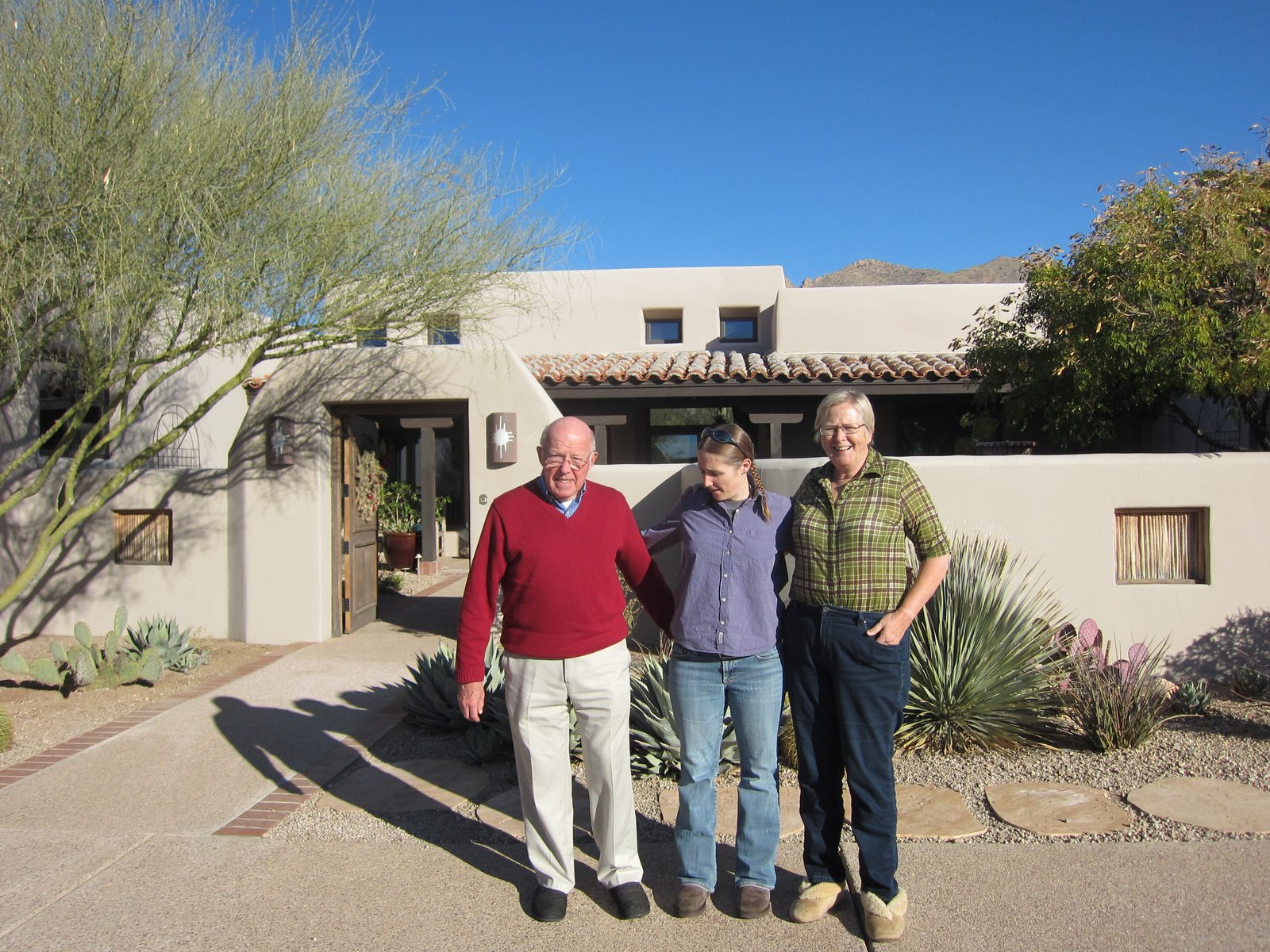 I was hoping for a great picture of Mom, Dad, and me, but the very bright sun made looking up difficult.