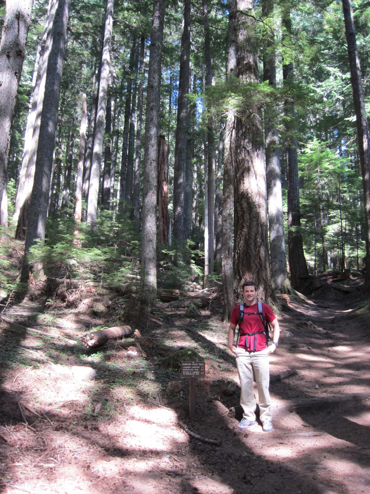 Jay by the signpost indicating our turnoff for the Rampart Ridge Trail.  4.9 miles to get back...