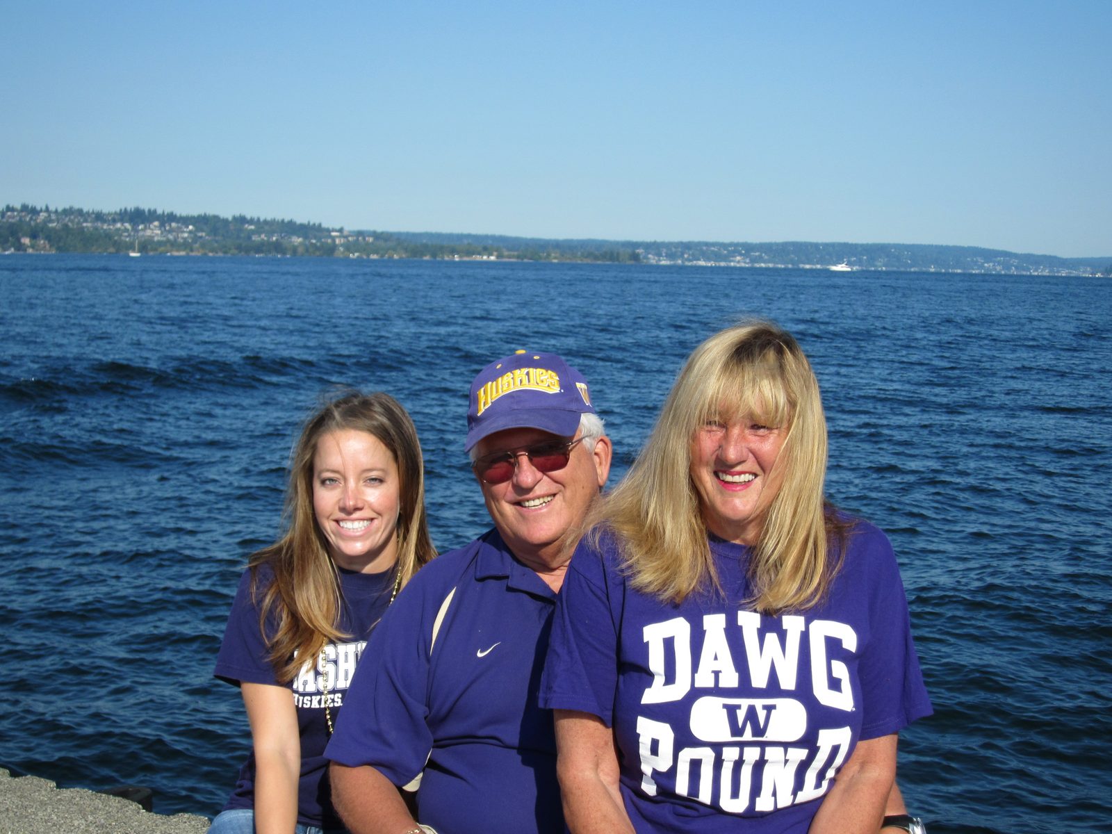 Sarah, Bob, and Lucie, waiting on the boat to take us to the UW Huskies football game.