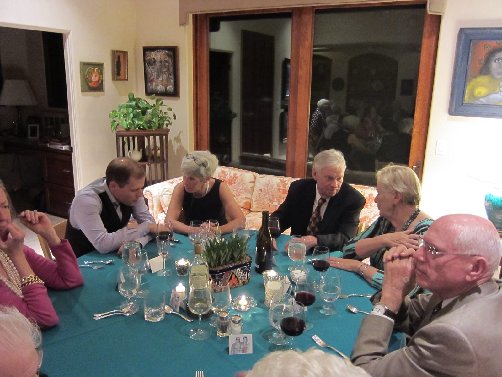 Deep conversations are going on.  Note the Tucson-styled centerpieces.