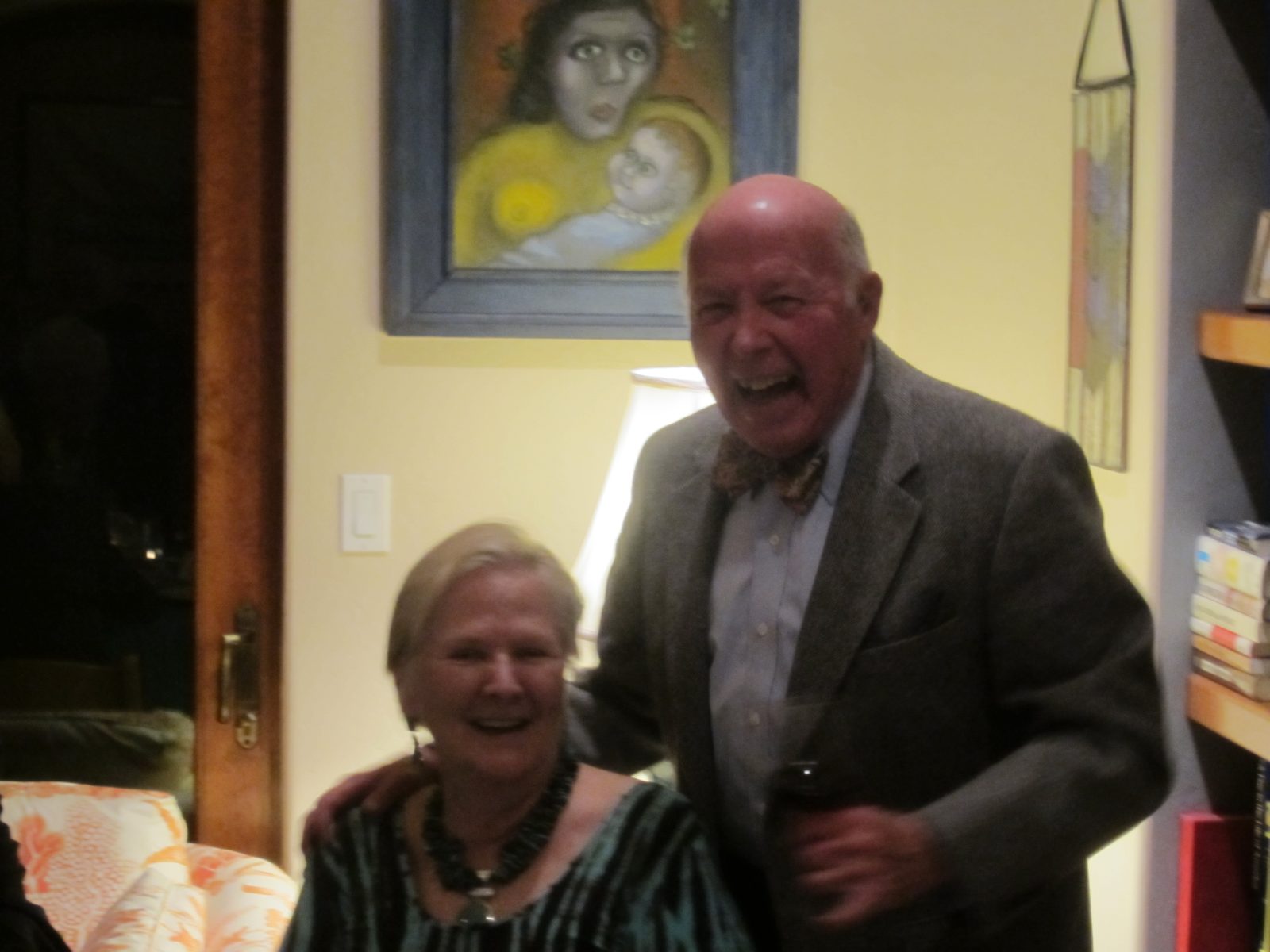 Lots of smiles!  ... try to ignore the creepy painting in the background.