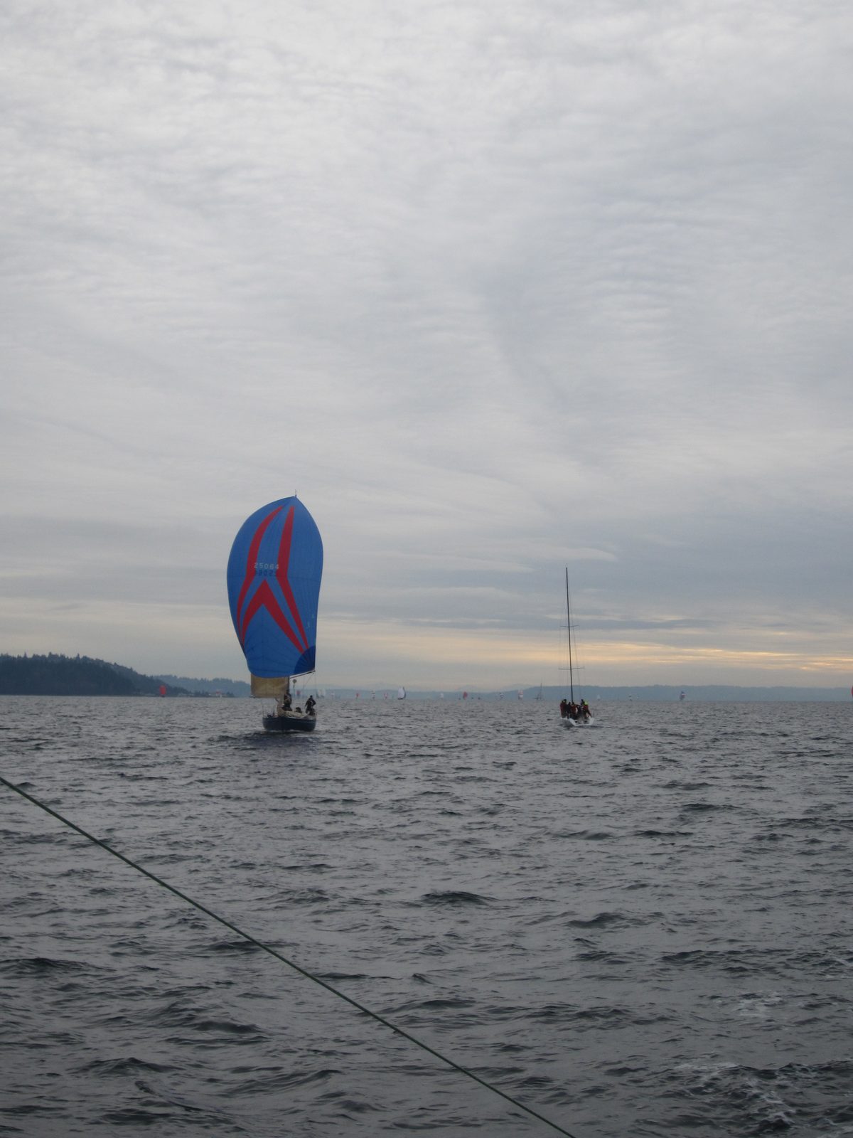 The boat we did battle with much of the race.  Note the spinnaker -- the first leg was almost...