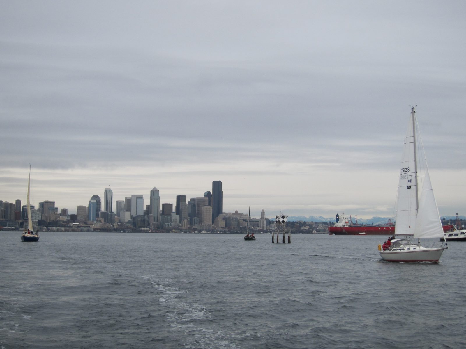 Sailboats, Duwamish Head marker, and downtown.  And the Cascades.