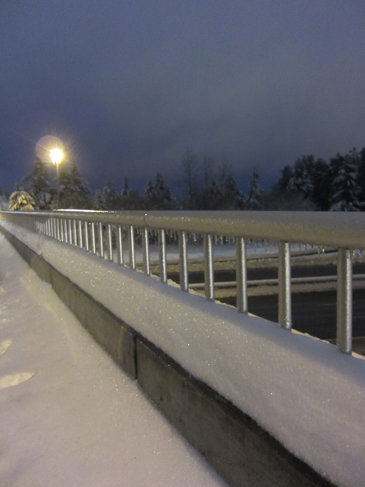 Crossing I-5, the bigger problem becomes evident -- it's raining, and icing.