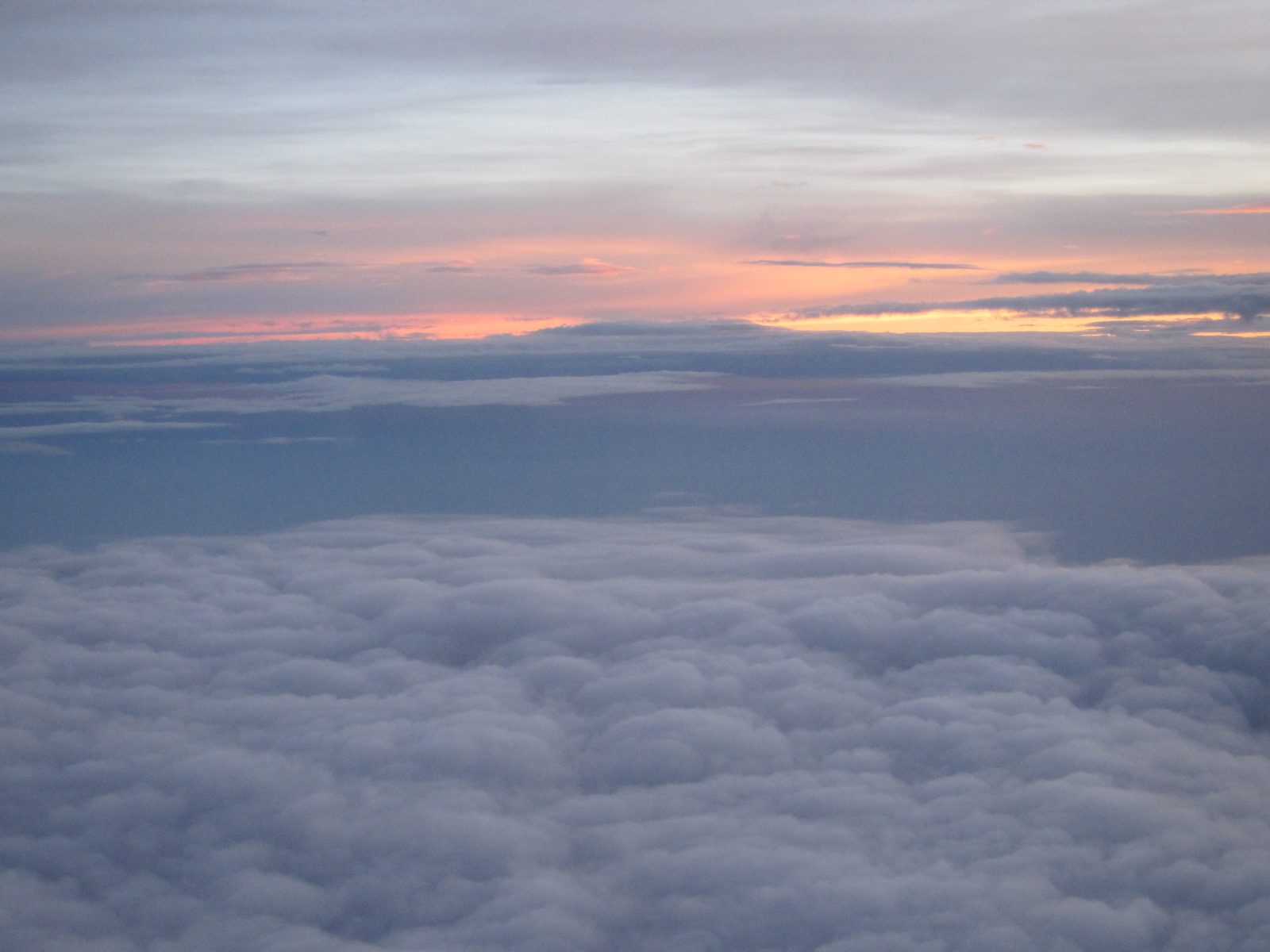 While flying back to Seattle from Dallas.  We seemed to chase the sunset the entire trip.