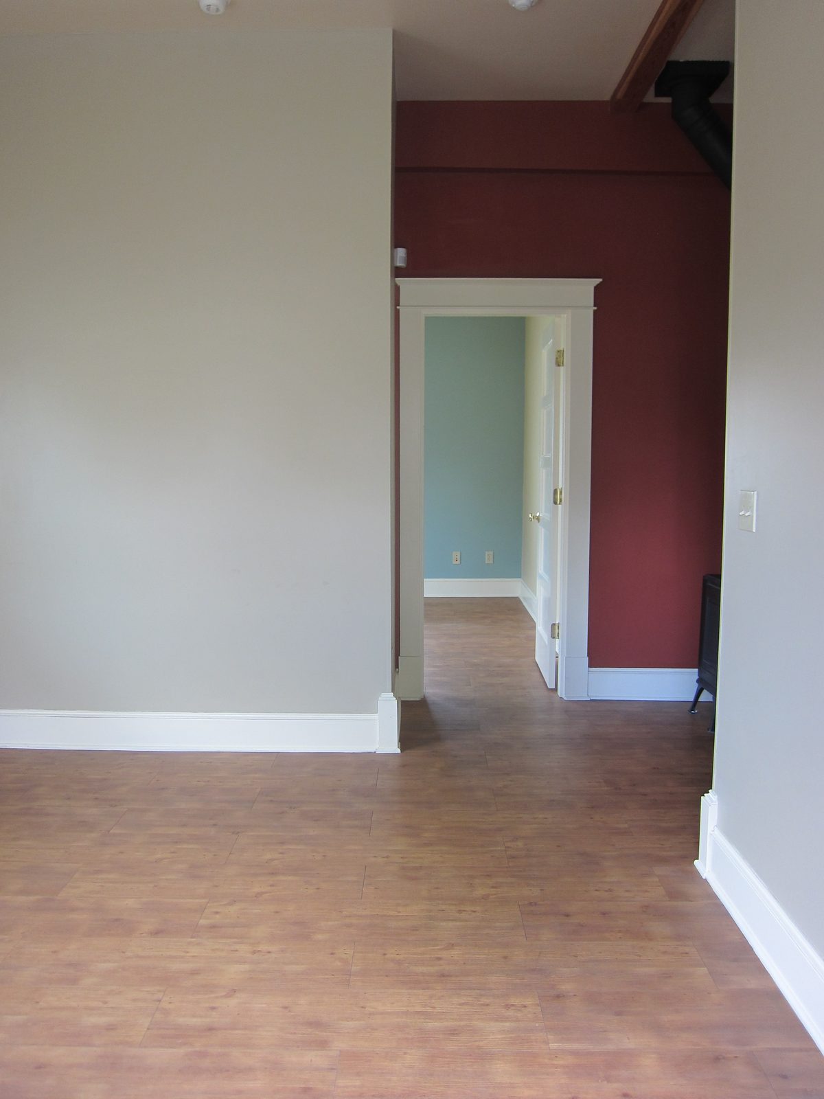 My new apartment!  This picture taken from the front door, looking at the living room to the...