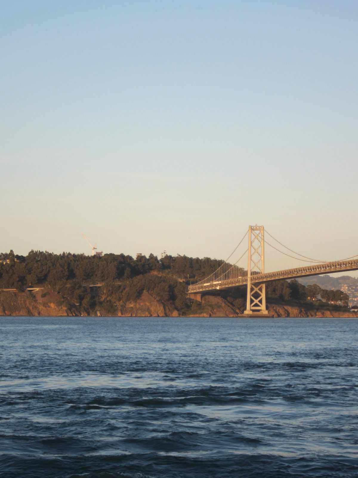 Yerba Buena Island and one tower of the west span of the Bay Bridge.