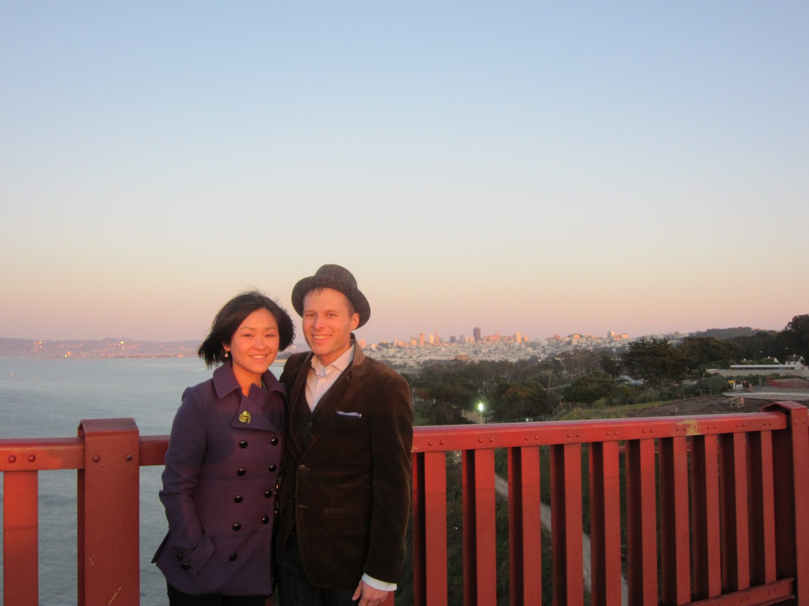 John and Monica with the city behind.