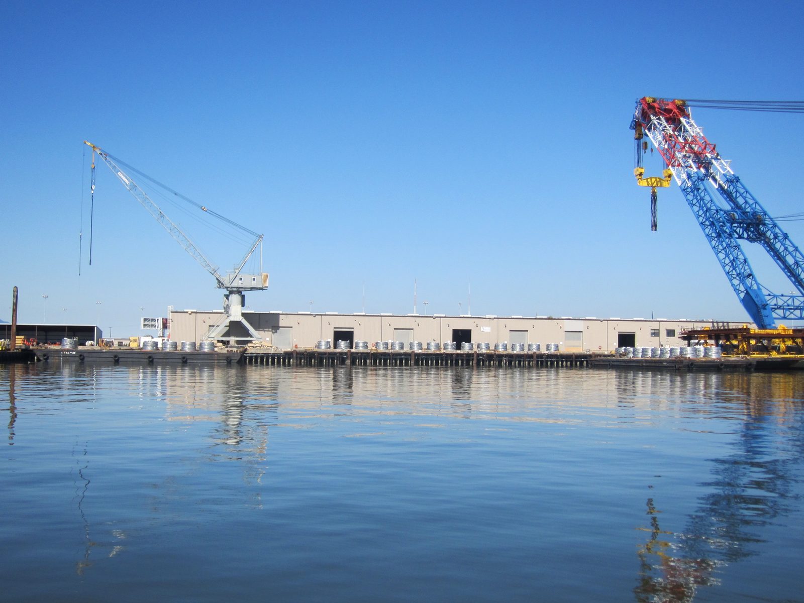 Remember the spool of wire we saw being lifted to the deck?  Here, his buddies sit and wait for...