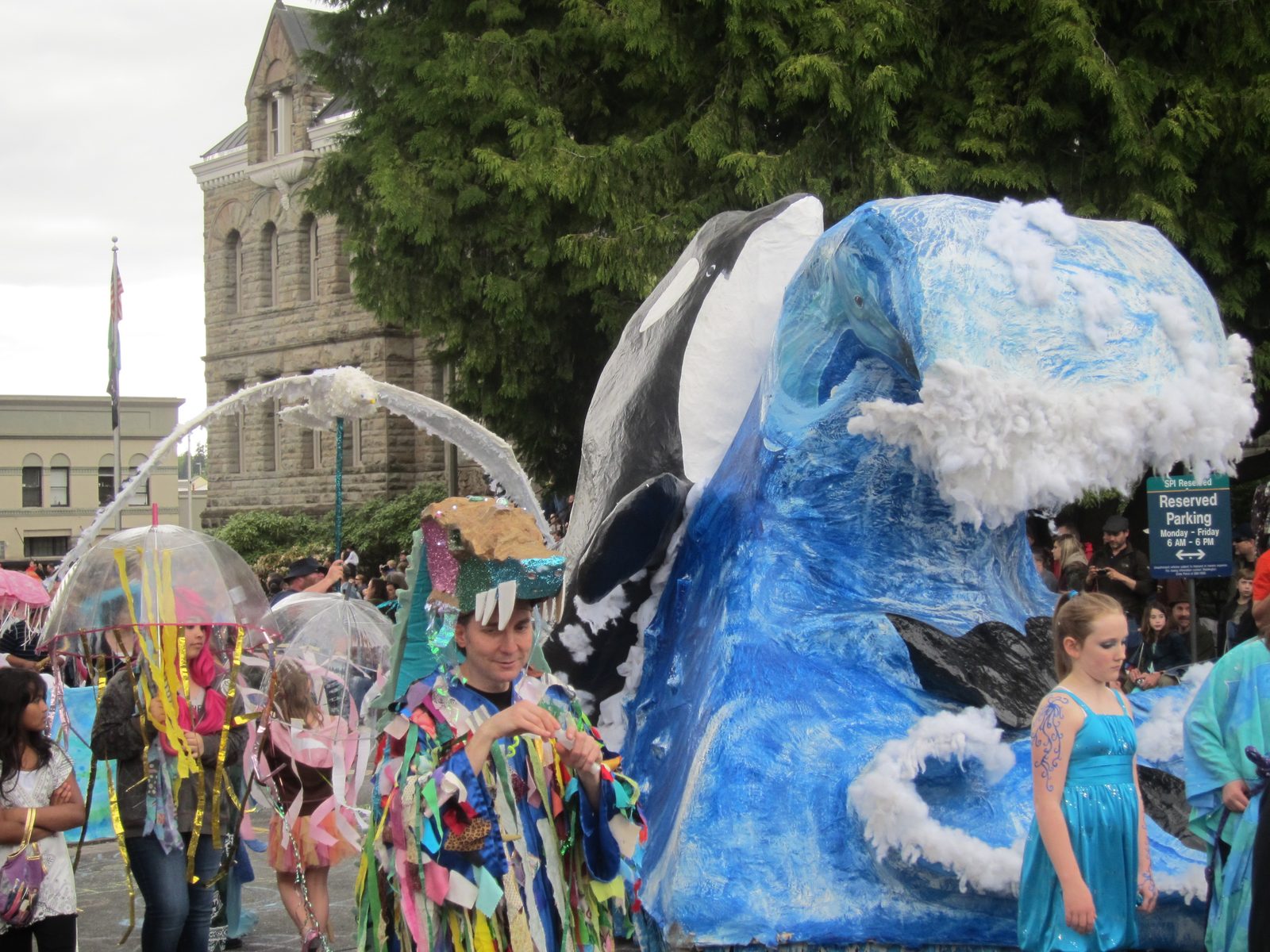 Shamu riding up a wave.  I realized too late that I could have easily worn my Nubrella and...