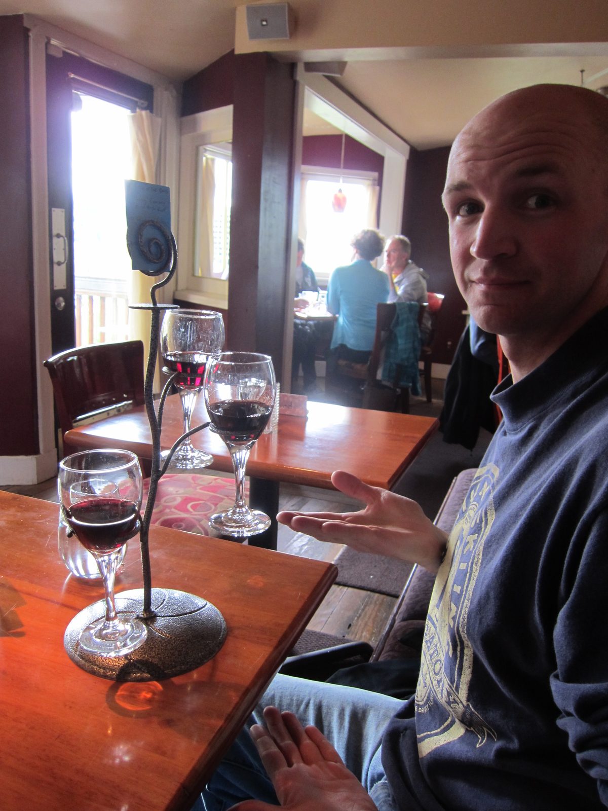 Jake shows off the wine-glass holder/tree provided with wine flights.