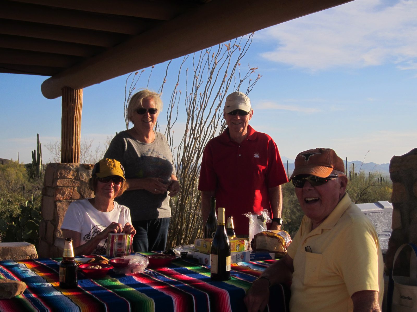 Gretchen, Mom, Jim, and Dad as dinner comes together.
