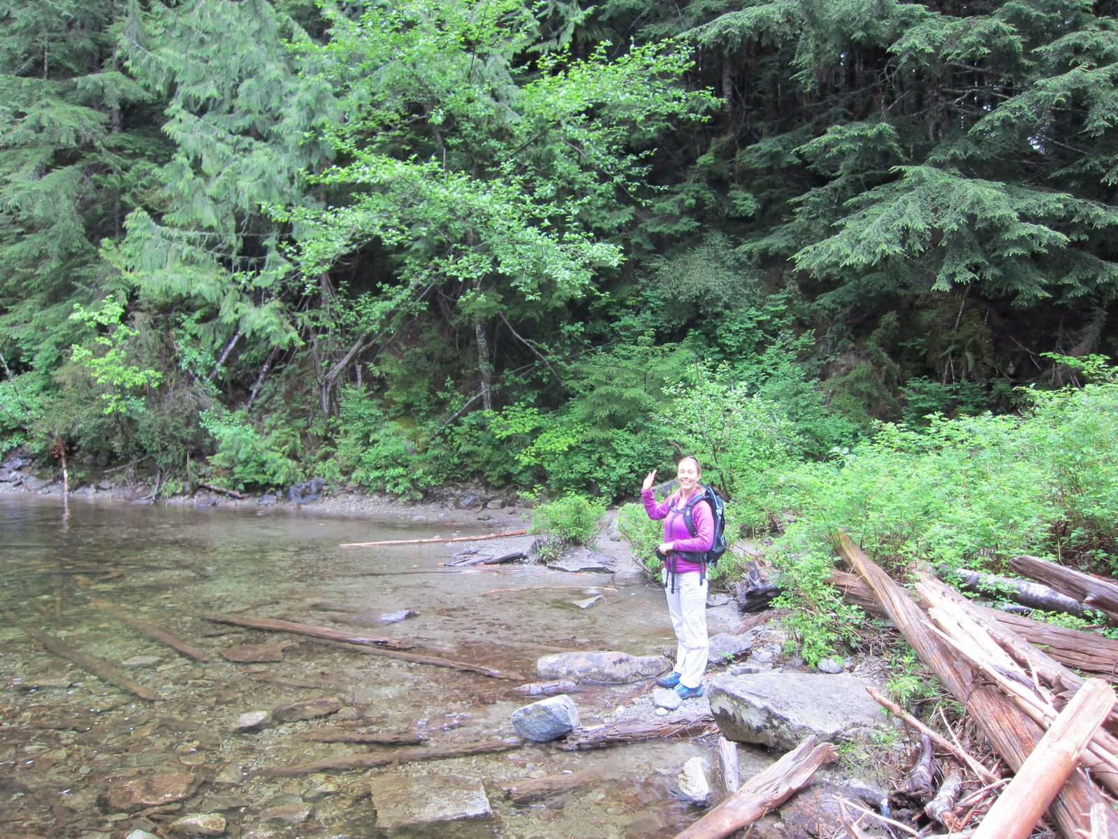 Diana stands at the edge of Lipsy Lake, into which Otter Falls tumblees.  The lake varied in...